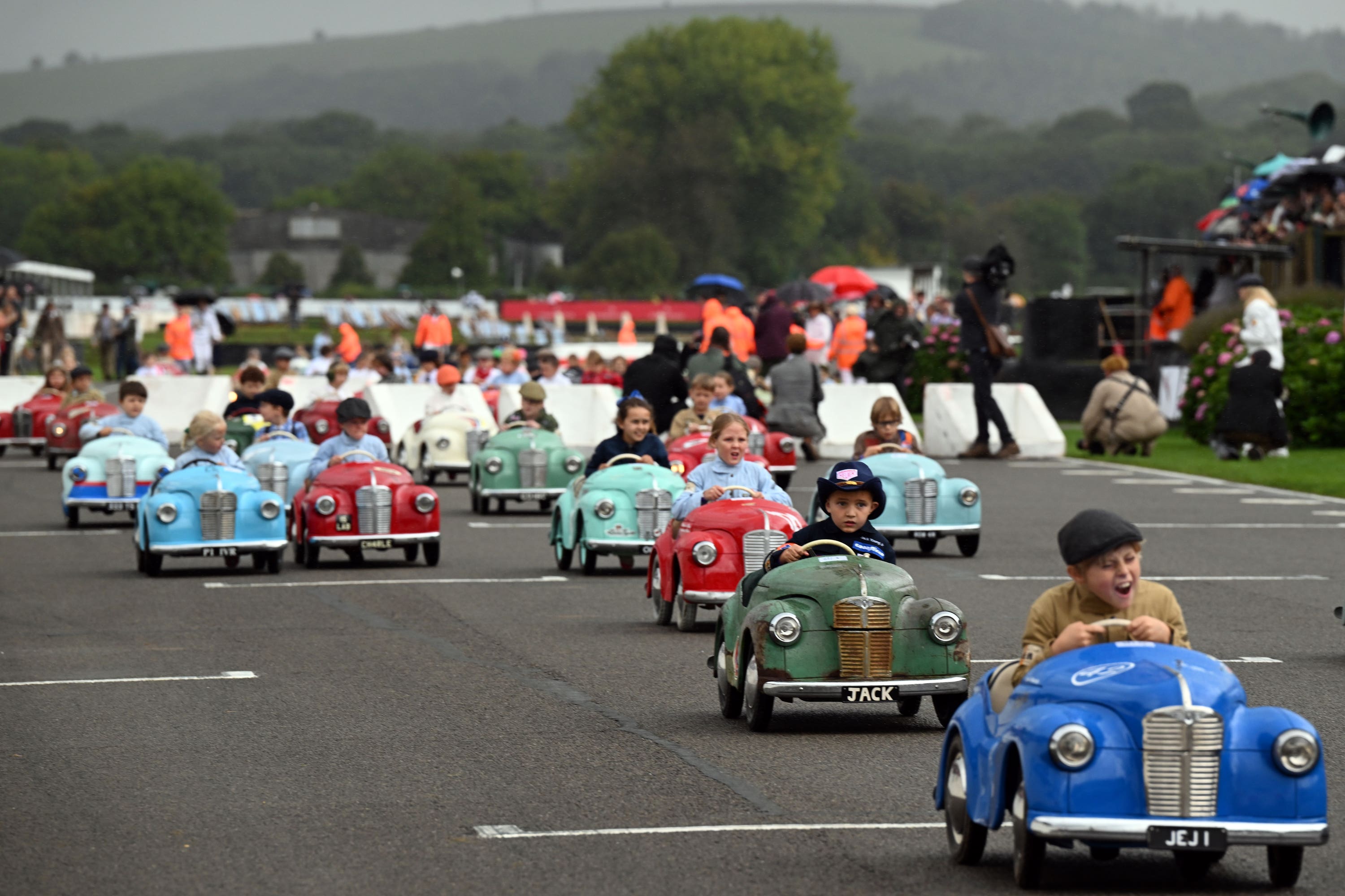 Young racers in the Settrington Cup at the Goodwood Revival at the Goodwood Motor Circuit in West Sussex (John Guyen/PA)