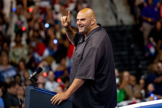 <p>Pennsylvania Senator John Fetterman, one of Joe Biden’s loudest supporters, spoke in support of Kamala Harris and Tim Walz onstage at a rally in Philadelphia on Friday </p>