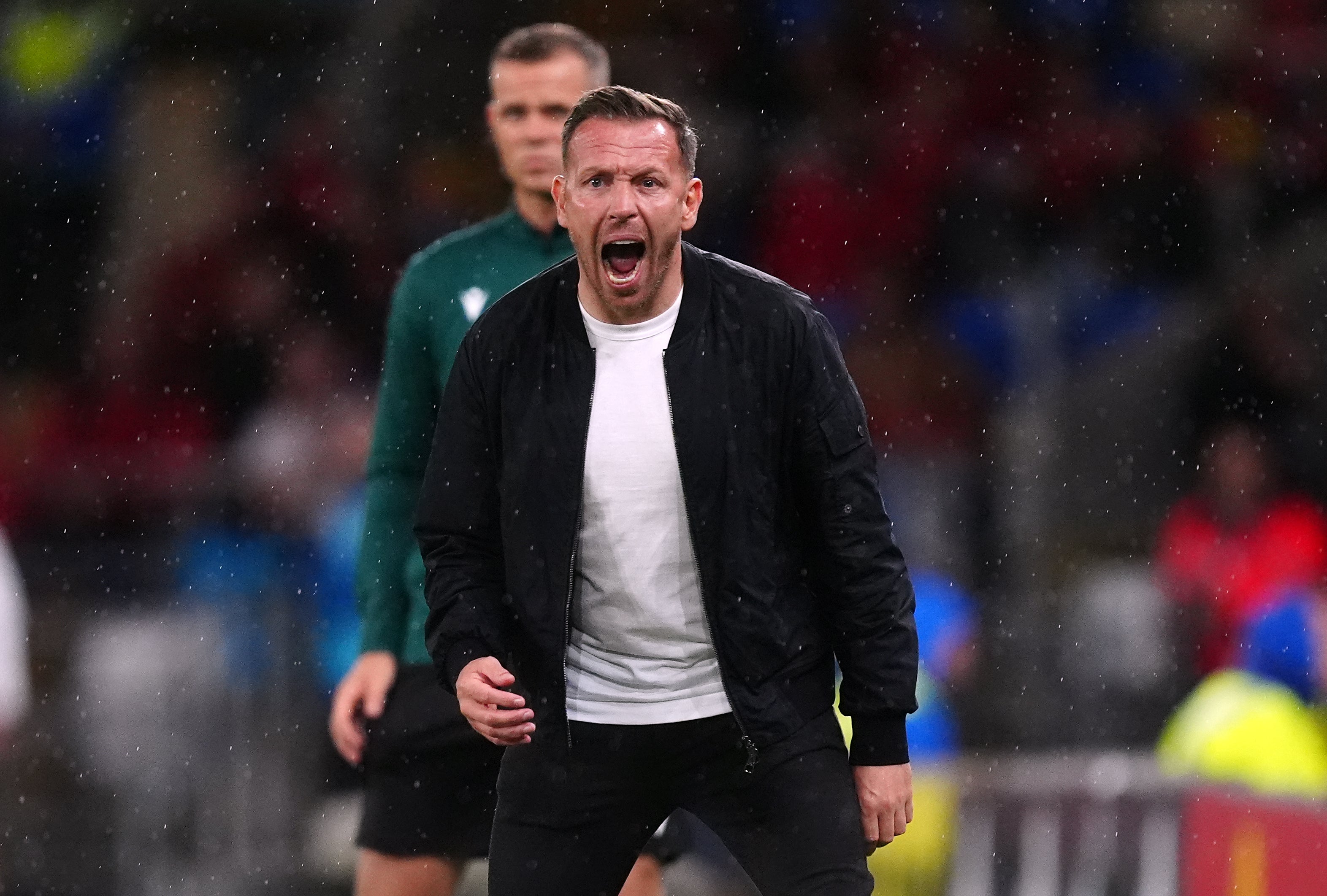 Craig Bellamy directs from the touchline (David Davies/PA)