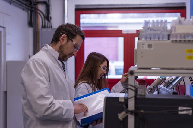 <p>Heriott-Watt University’s Dr Oleg Ishkov with PhD student Alsu Valiakhmetova (Tanya Jay/PA)</p>