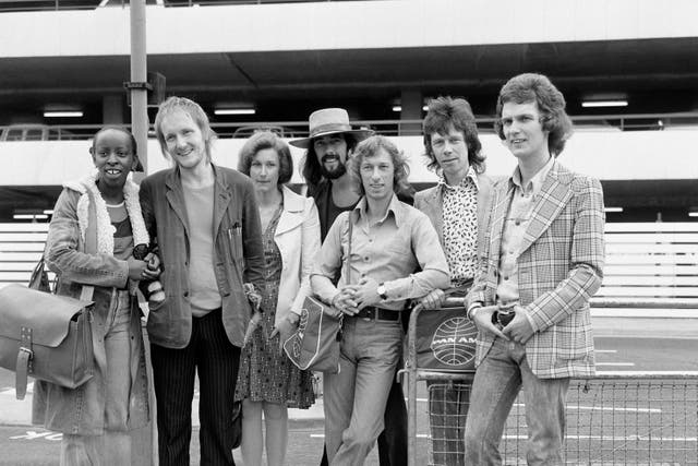 File photo dated July 1973 of the Blue Mink pop group including Roger Cook (wearing hat) and Madeline Bell (left) leaving London for Los Angeles, and the start of a two-week tour. Bass player Herbie Flowers (second right) has died aged 86 confirmed by close family members on Facebook (PA)