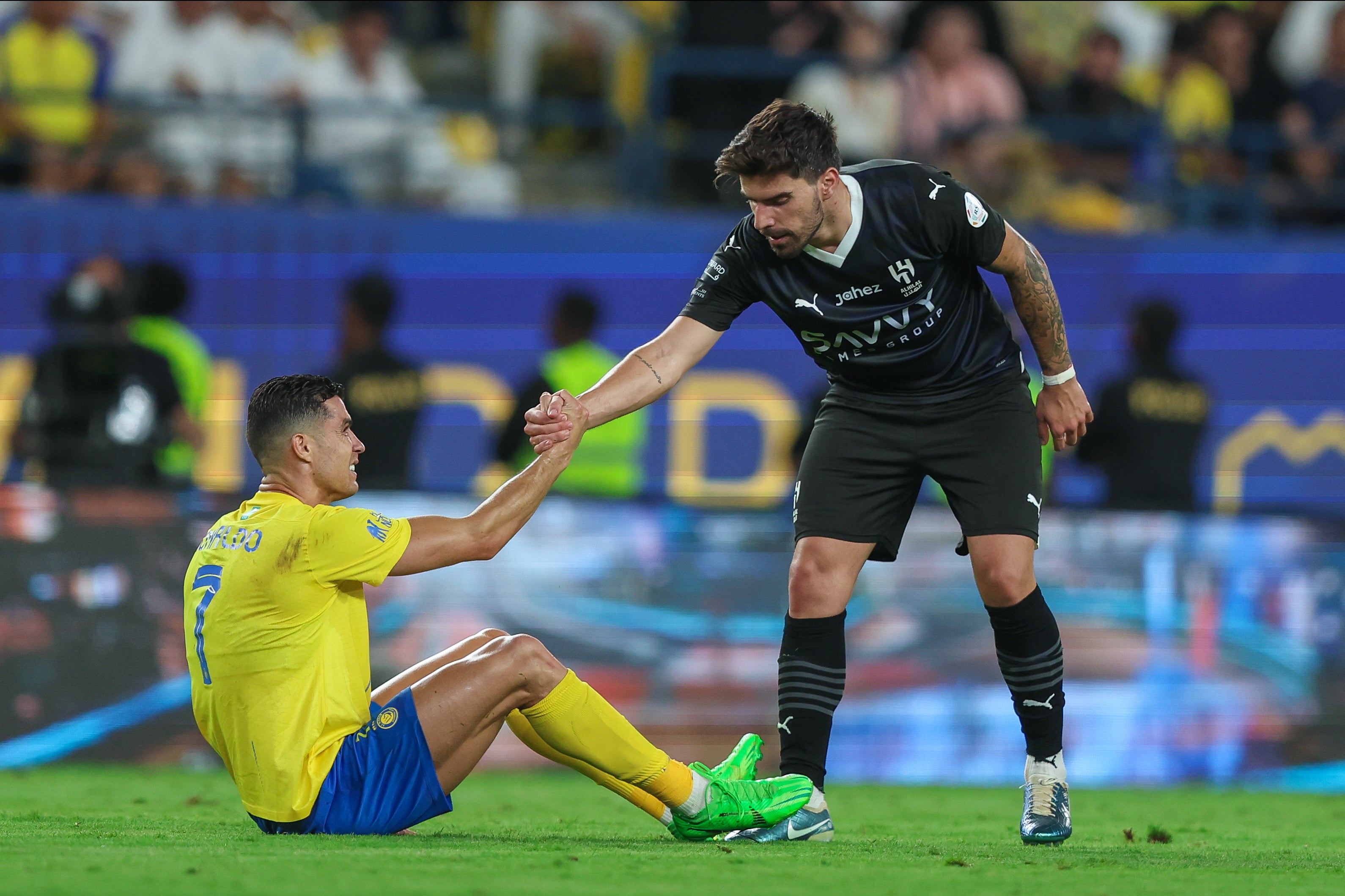Cristiano Ronaldo (left) and Ruben Neves both now ply their trade in Saudi Arabia