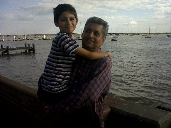 Mr Bankwala pictured as a boy with his father Kobad