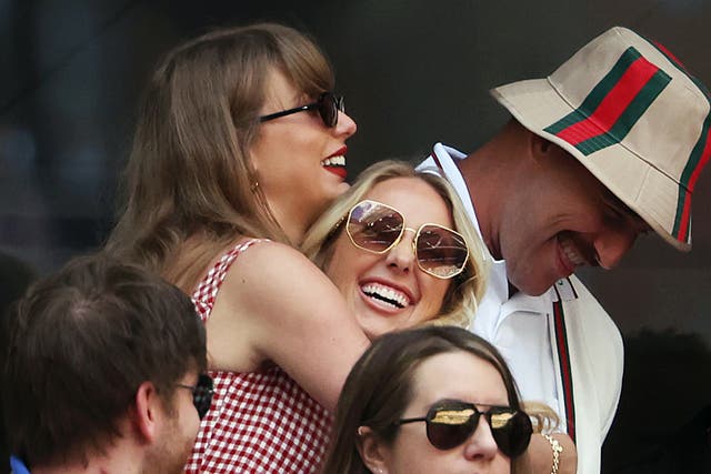 <p>Backlash: Swift’s friendship with Brittany Mahomes, centre, has been criticised by some fans </p>