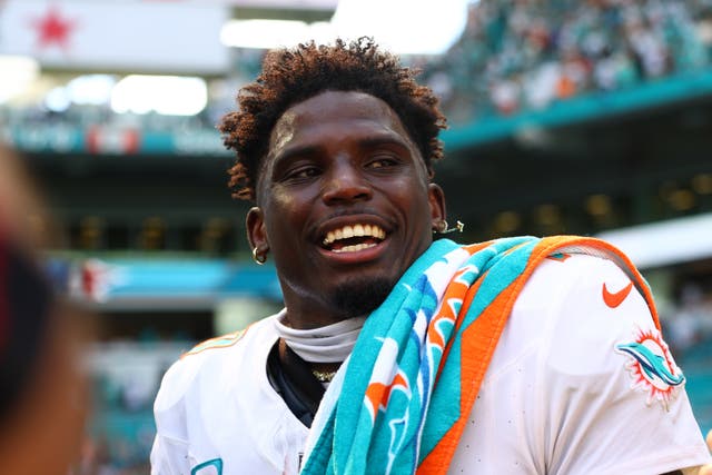<p>Tyreek Hill plays against the Jacksonville Jaguars on Sunday, hours after the Miami-Dade Police Department handcuffed him during a traffic stop. Hill’s agent said the wide receiver is considering legal action</p>