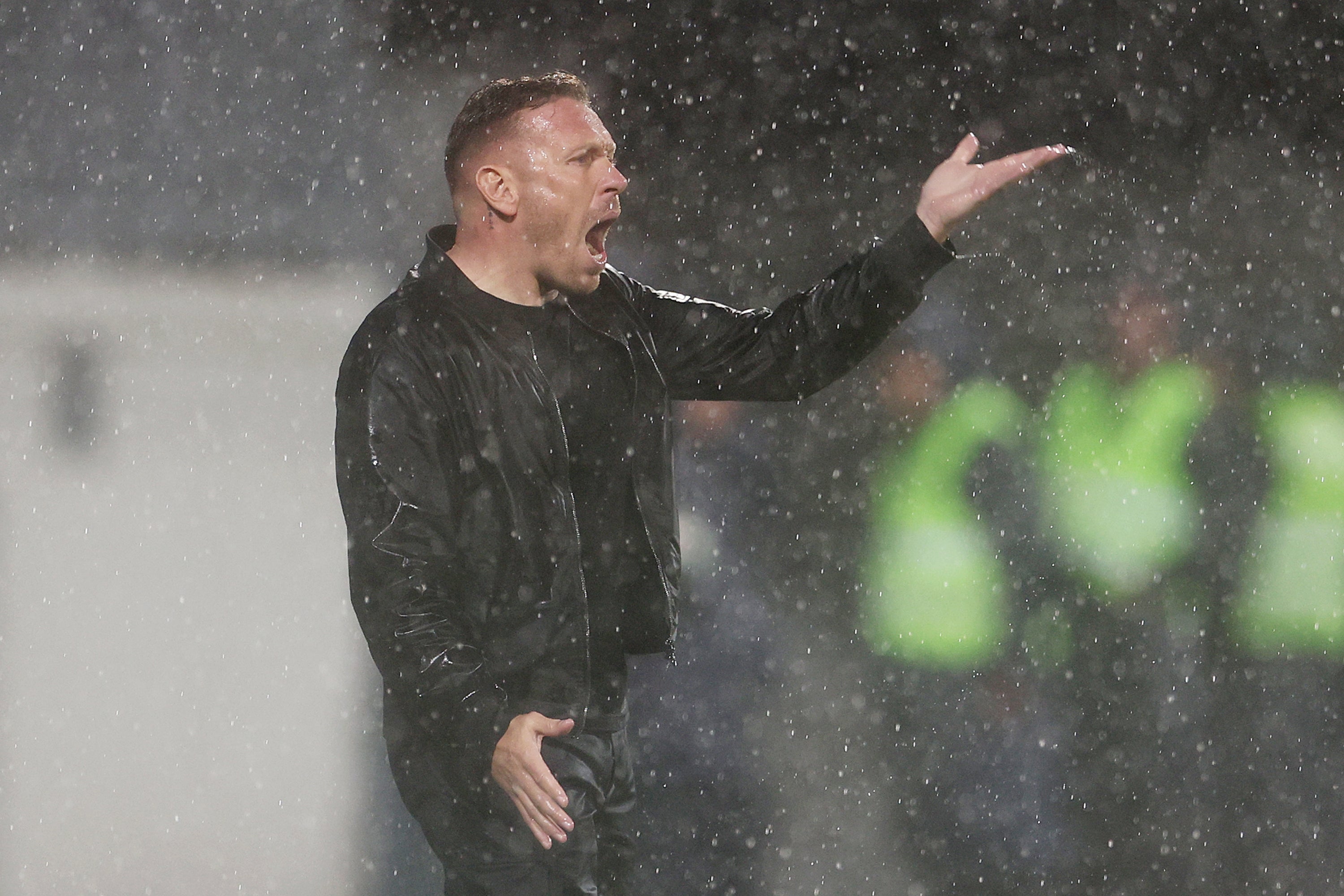 Craig Bellamy directs from the touchline