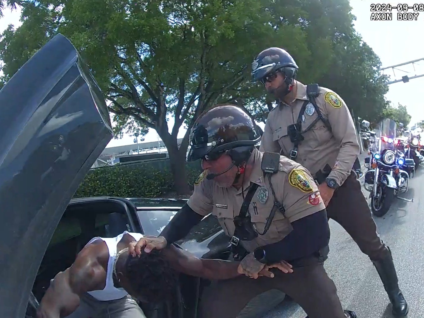 Miami motorcycle cops pull NFL star Tyreek Hill from his vehicle on September 8, 2024