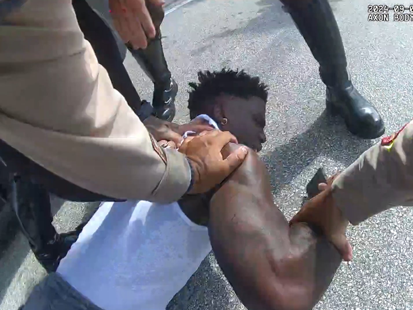 Miami police push Tyreek Hill to the ground on September 8