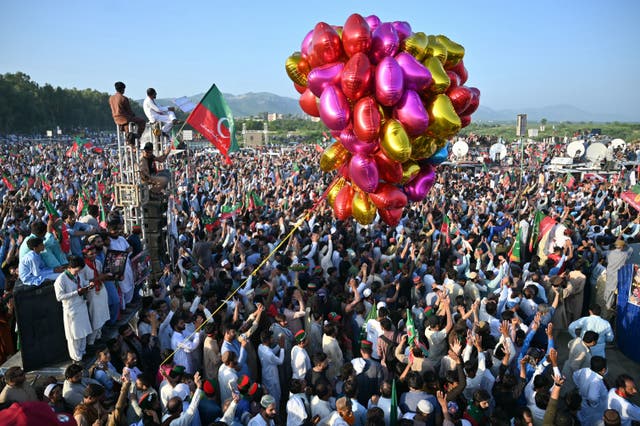 <p>Supporters of Pakistan Tehreek-e-Insaf (PTI) party of former prime minister Imran Khan take part in a public rally on the outskirts of Islamabad </p>