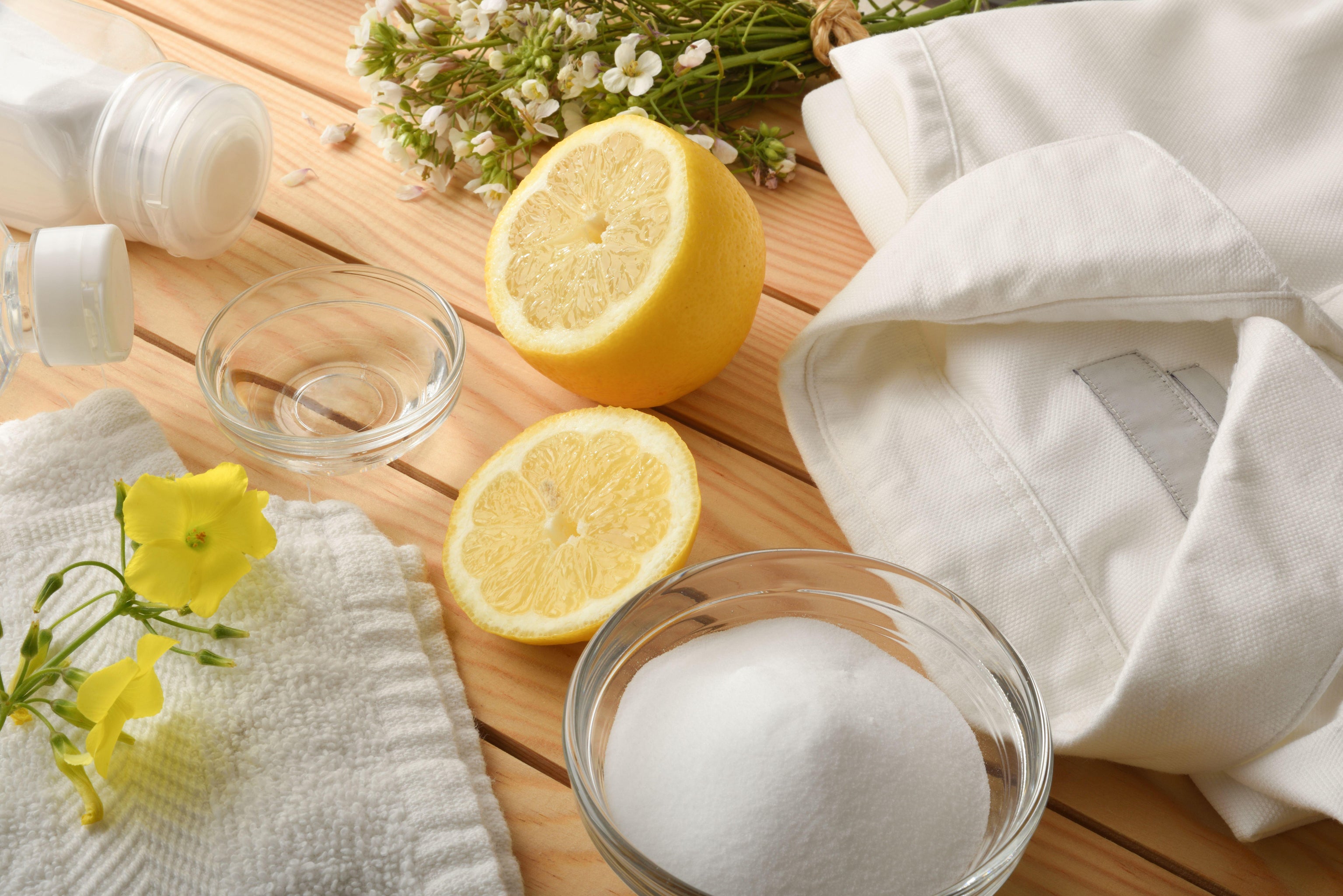 White shirt and lemon for stain removal and eco-friendly cleaning