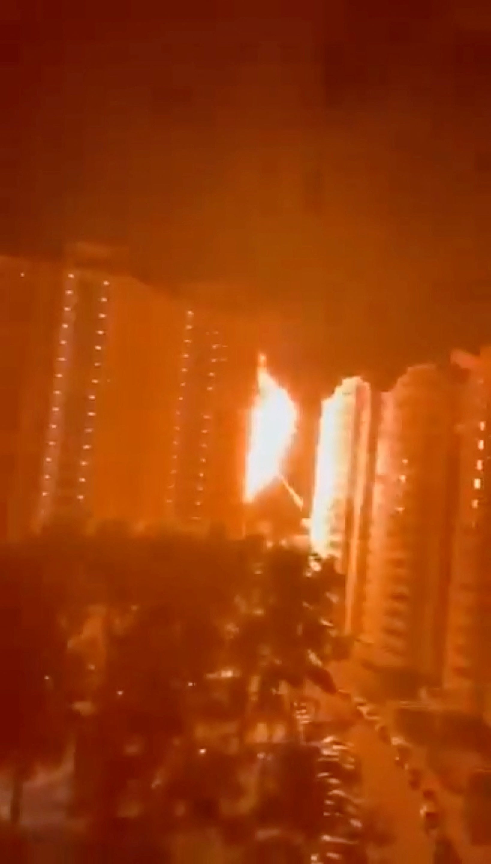 A residential building is hit by an explosion after being struck by what was said to be a drone strike launched by Ukraine, in the Ramenskoye district of the Moscow region