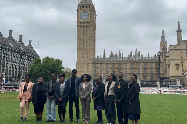 Members of the World Afro Day group took their campaign the Parliament on Tuesday (Claudia Savage/PA)