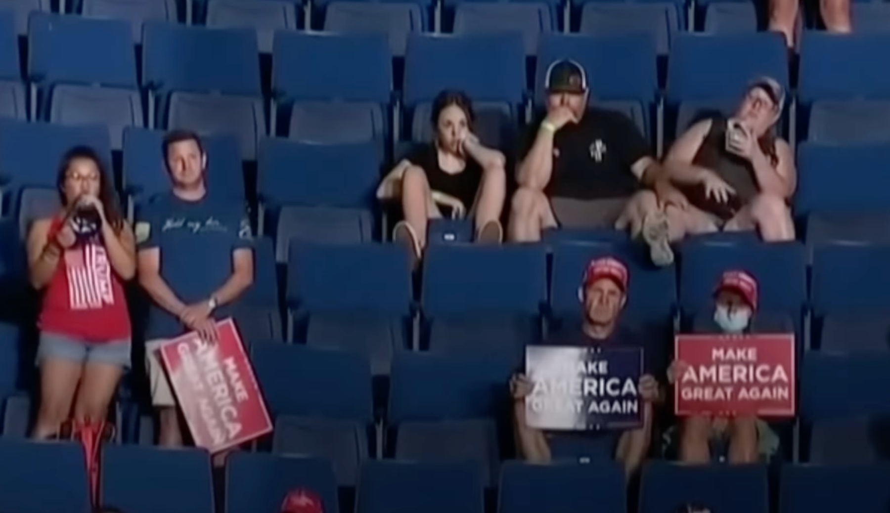 A selected shot from a crowd at a Trump rally that features in the Harris campaign ad