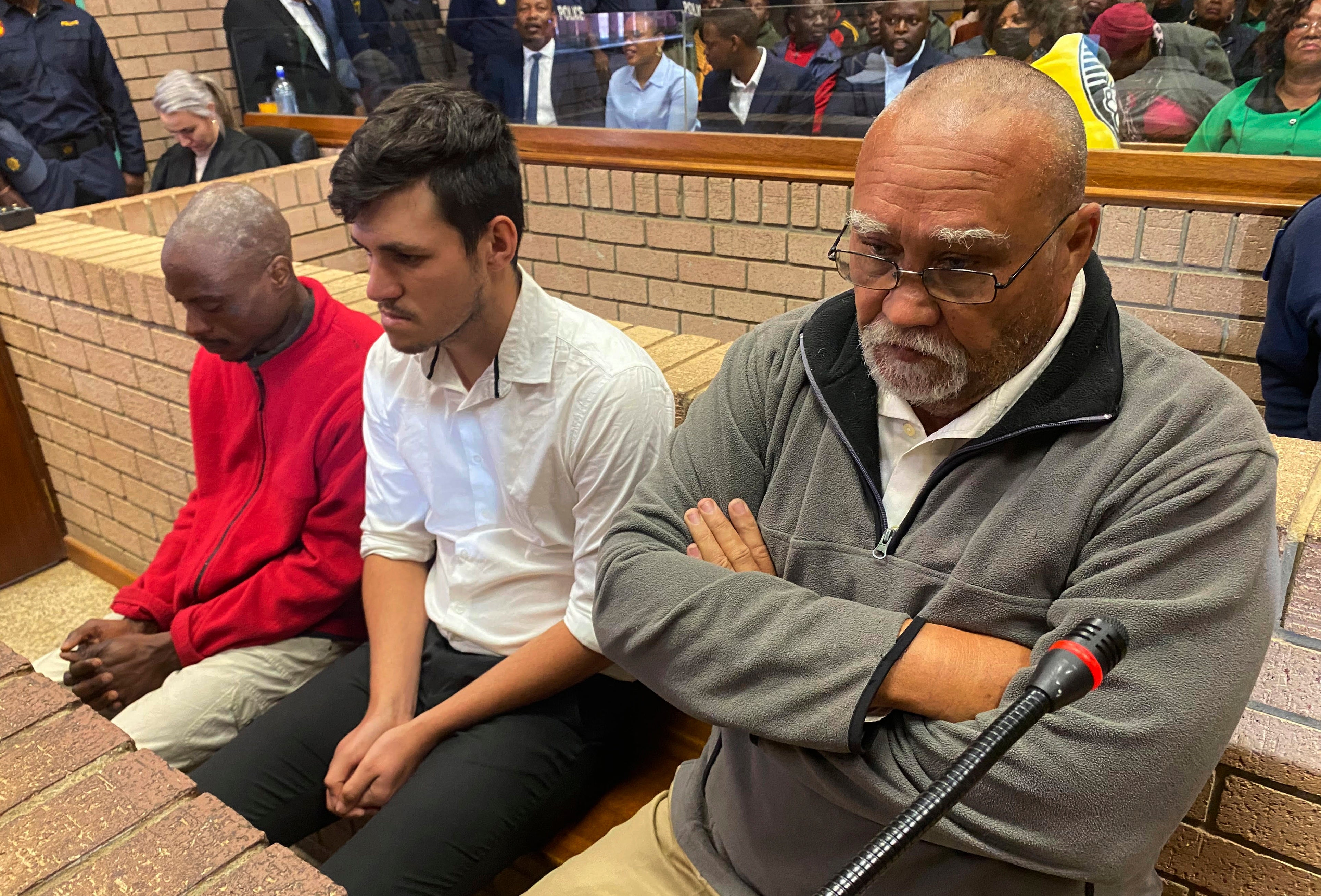 Three men accused of killing two women and feeding their bodies to pigs, from right to left, farm-owner, Zachariah Olivier, supervisor, Adrian Rudolph de Wet and employee, William Musora appear in court Polokwane, South Africa, Tuesday, Sept. 10, 2024