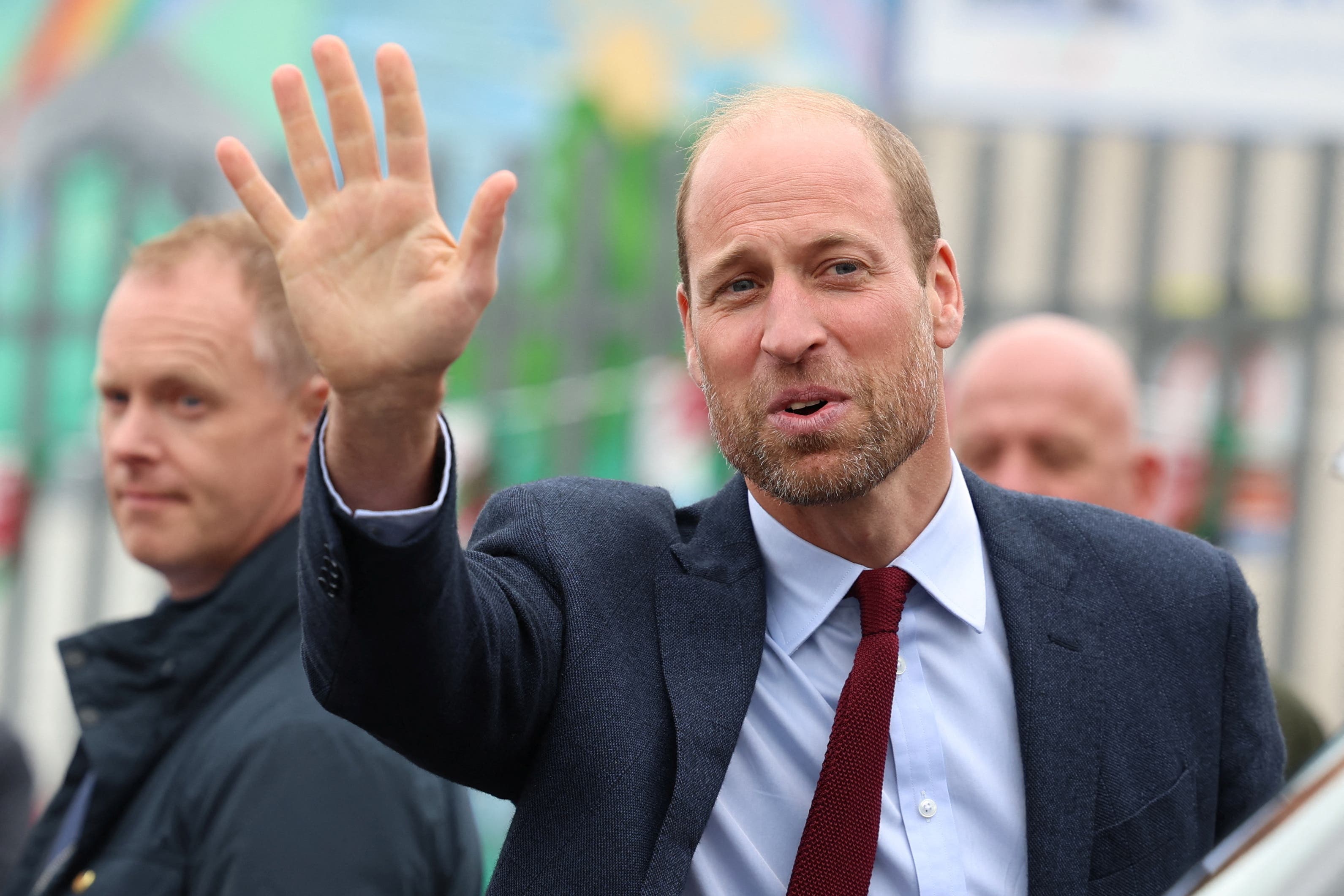 The Prince of Wales waves on a visit to Swiss Valley Community Primary School in Llanelli (Phil Noble/PA)