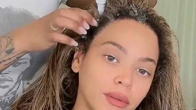 <p>Beyoncé shares rare glimpse of natural hair care routine in new video.</p>