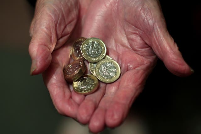 The Tories have accused ministers of ‘broken promises’ and issuing a ‘punishment beating’ against pensioners by cutting the winter fuel payment (Yui Mok/PA)