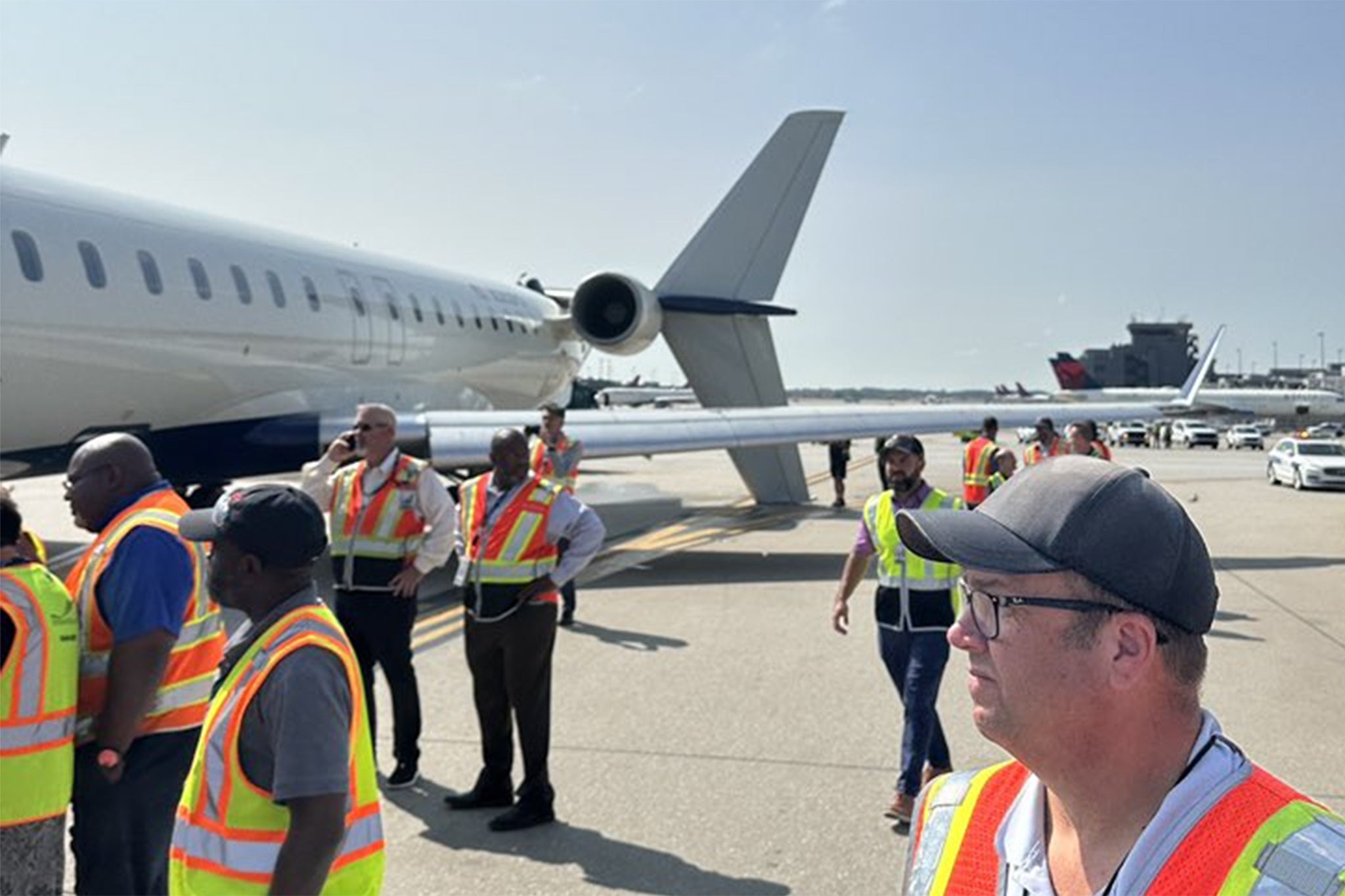 Plane with broken tail after collision between two Delta planes at Hartsfield-Jackson Atlanta International Airport