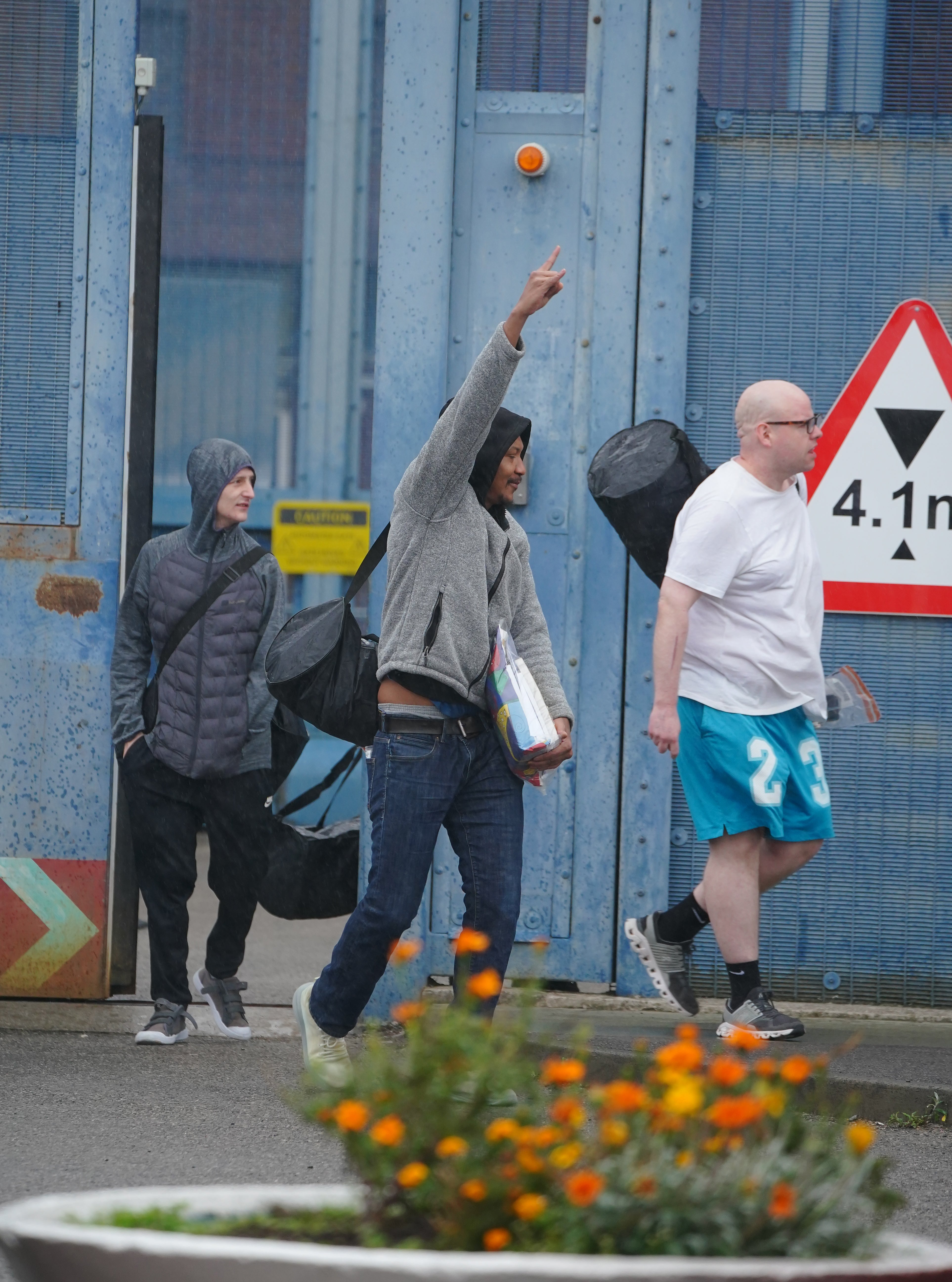 Prisoners celebrated their release from HMP Liverpool after serving 40 per cent of their sentence under emergency measures to ease overcrowding