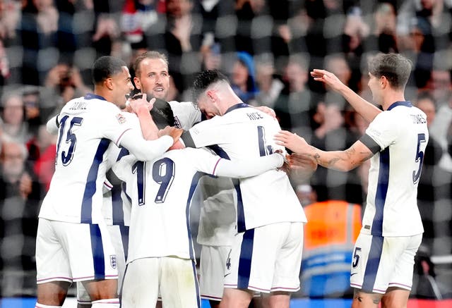 <p>England players congratulate Harry Kane after their second goal</p>