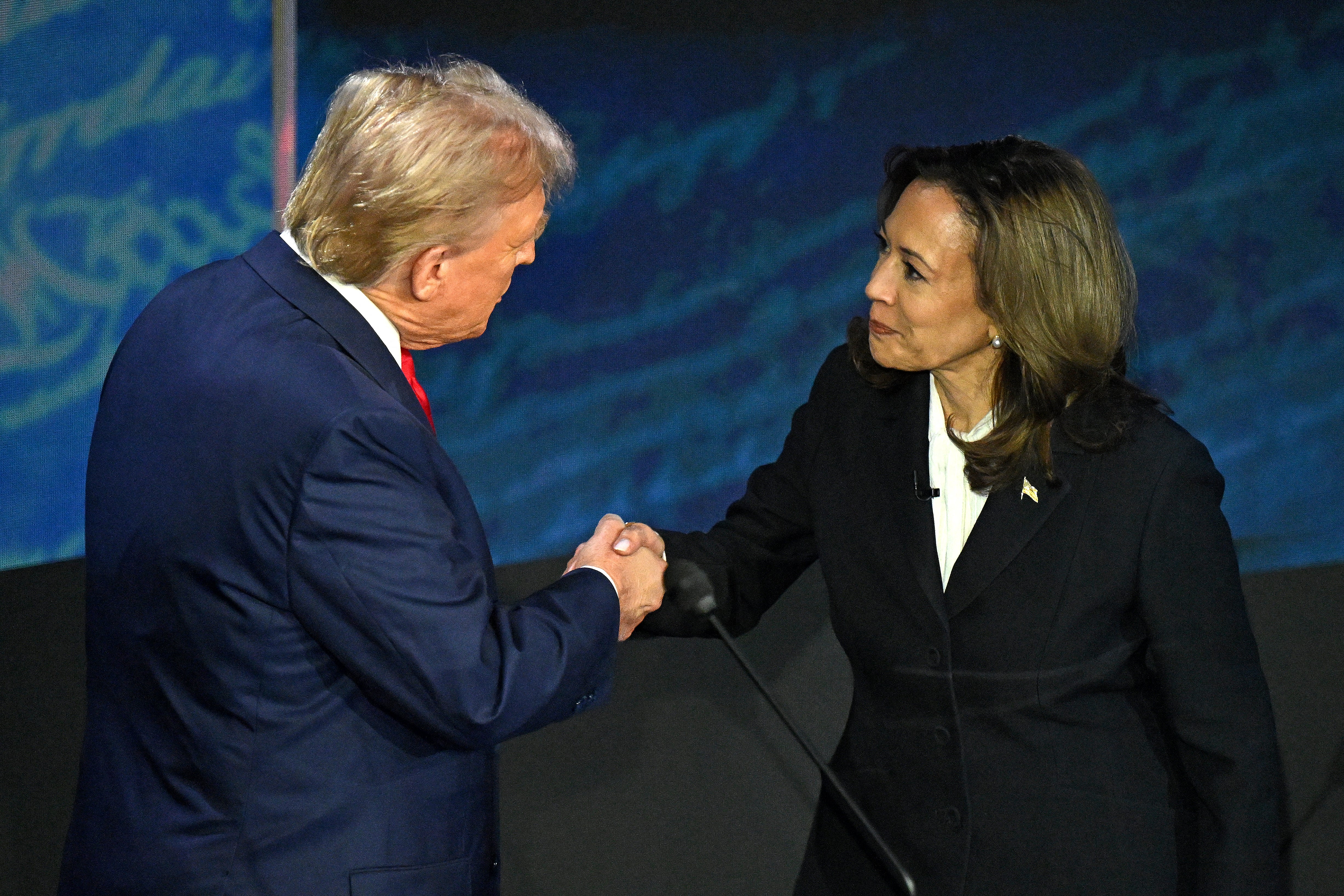 Donald Trump and Kamala Harris shake hands ahead of their first-ever 2024 presidential debate on ABC on September 10.