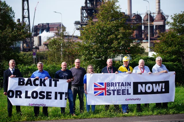 Workers outside Tata Steel’s Port Talbot steelworks (Ben Birchall/PA)