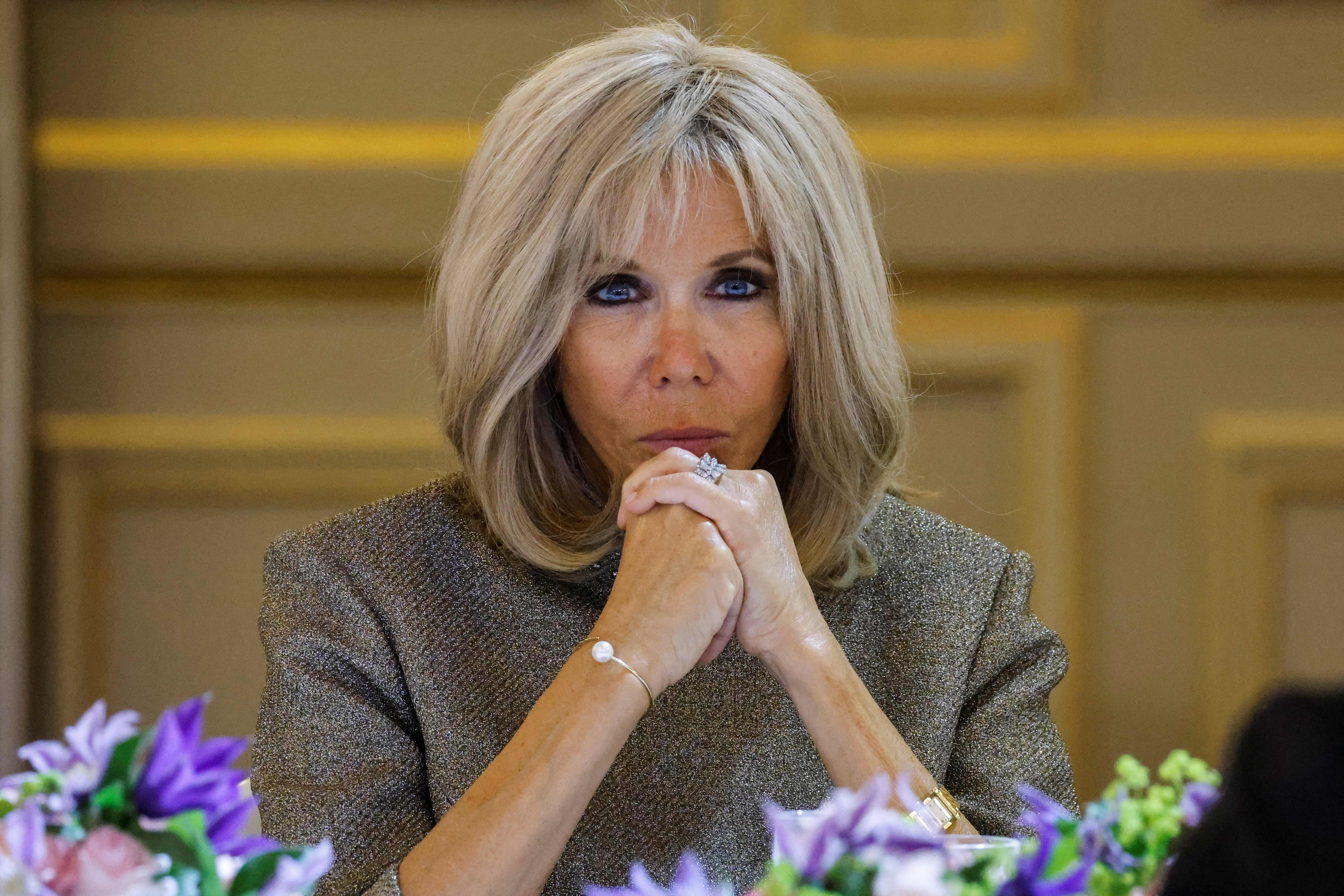 Brigitte Macron has been awarded €8,000 in damages after two women falsely accused her of being transgender