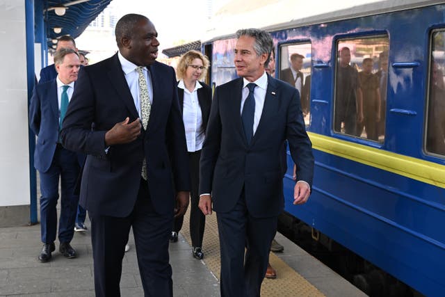 Foreign Secretary David Lammy (centre left) and US Secretary of State Antony Blinken (right) arrive at Kyiv train station (Leon Neal/PA)