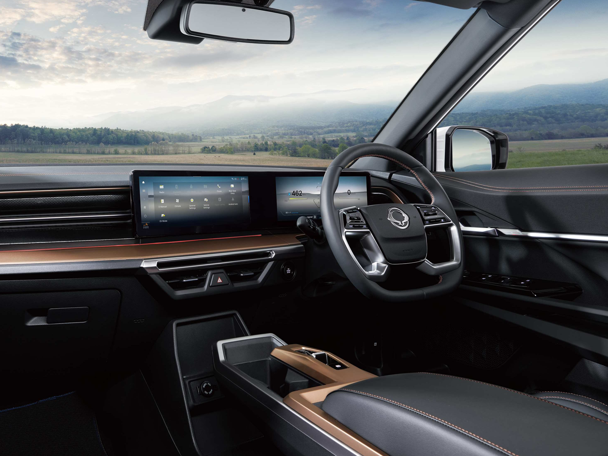 Inside, the KGM Torres EVX has a spacious and modern interior with two 12.3-inch screens.