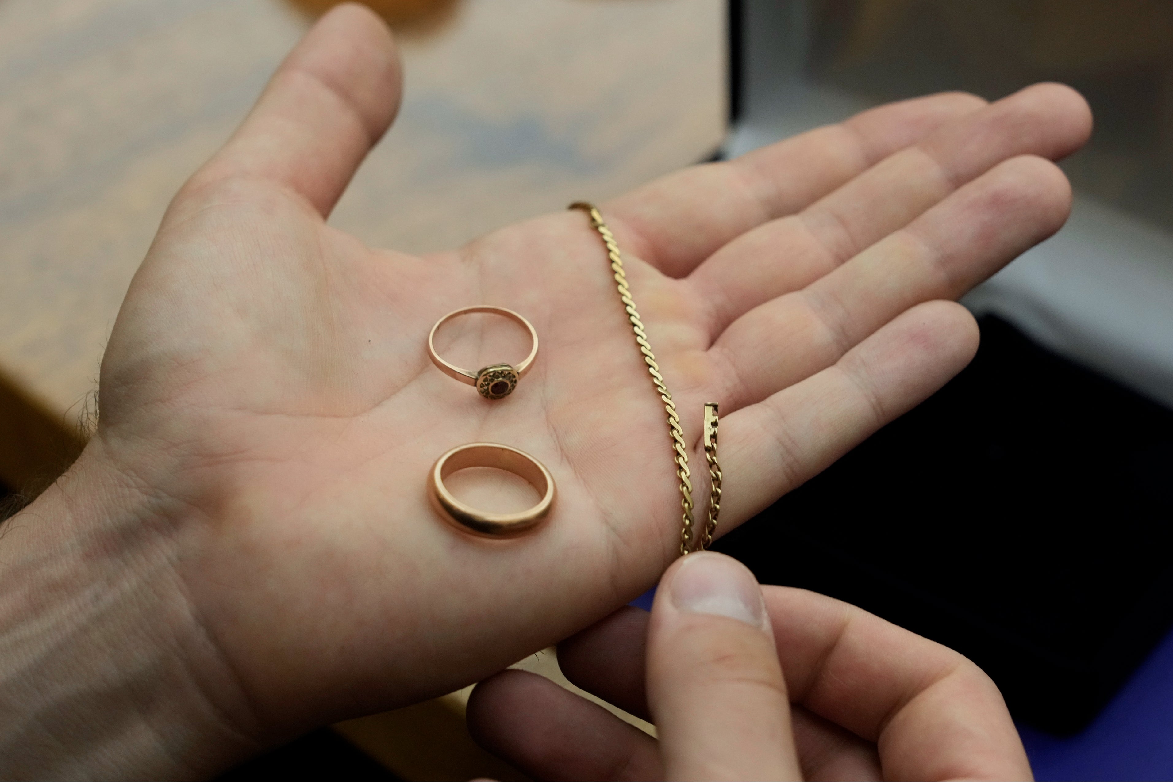 A relative shows items that were confiscated by Nazis from Zofia Strusinska and her sister Jozefa Skorka