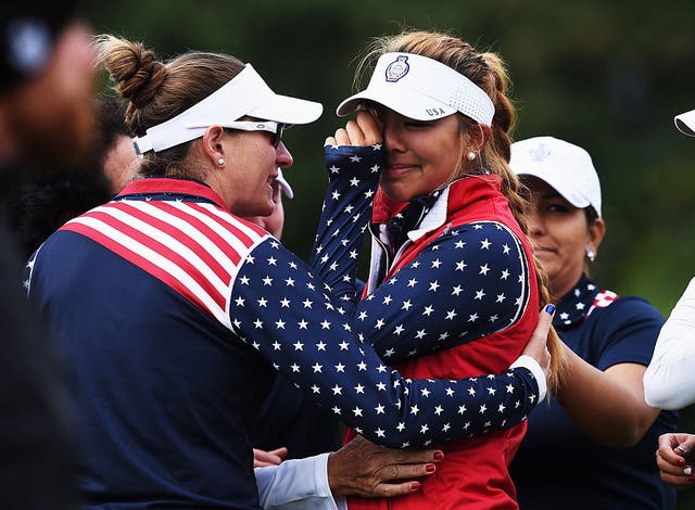 <p>Team USA’s Alison Lee cries shortly after losing the 17th hole to Europe in controversial circumstances at St Leon-Rot Golf Club, Germany in 2015 </p>