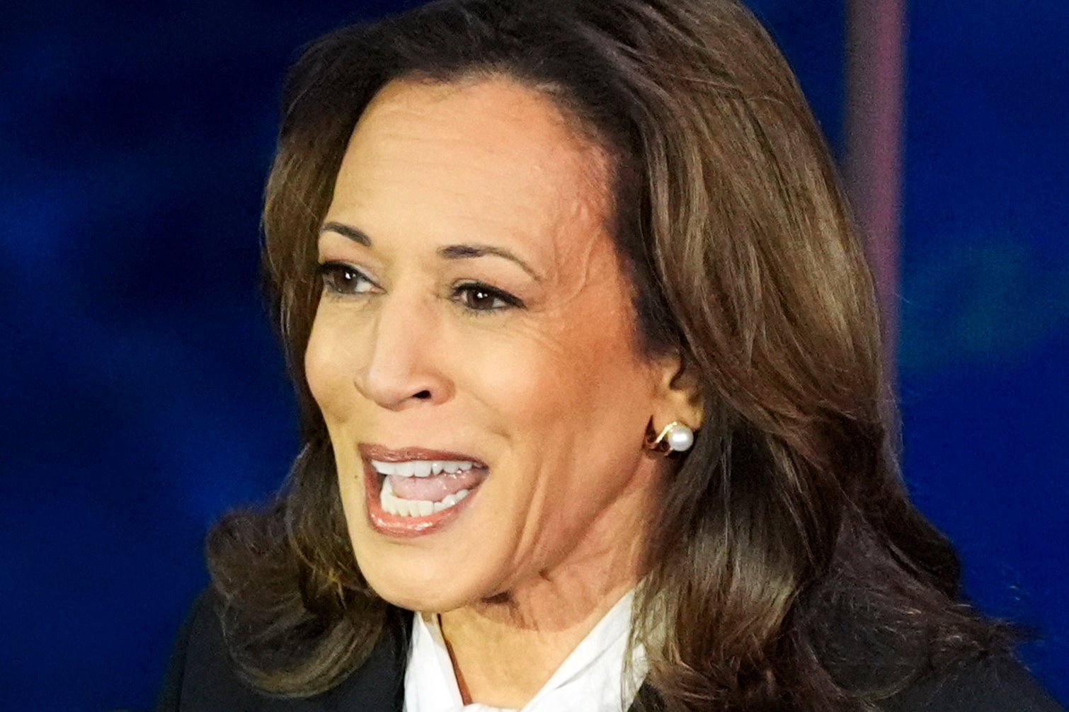 Democratic presidential nominee Vice President Kamala Harris speaks during a presidential debate with Republican presidential nominee former President Donald Trump at the National Constitution Center in Philadelphia, Tuesday, Sept. 10, 2024. Some baselessly claimed she was being fed answers via earpieces