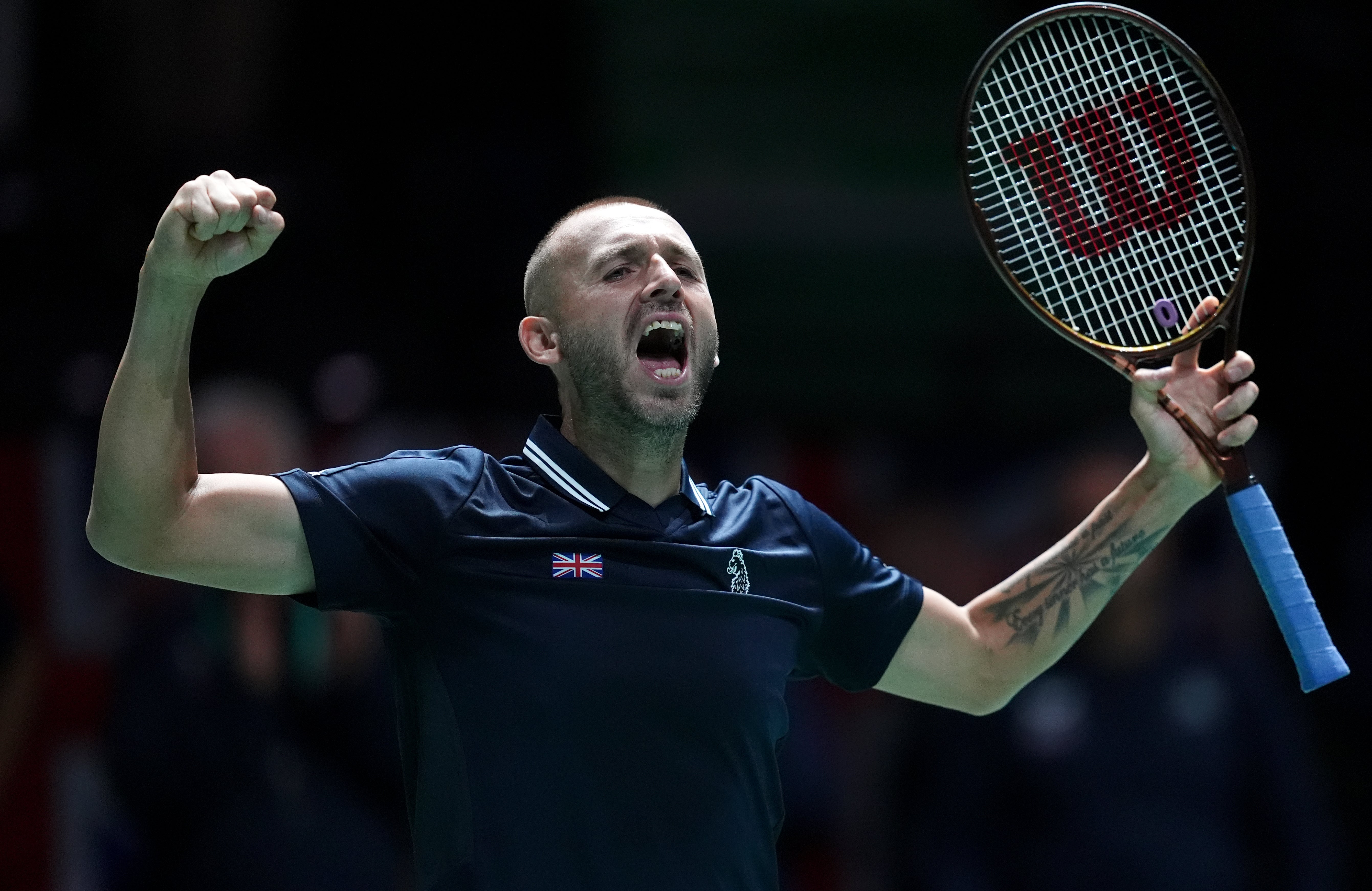 Dan Evans celebrates beating Eero Vasa (Martin Rickett/PA)