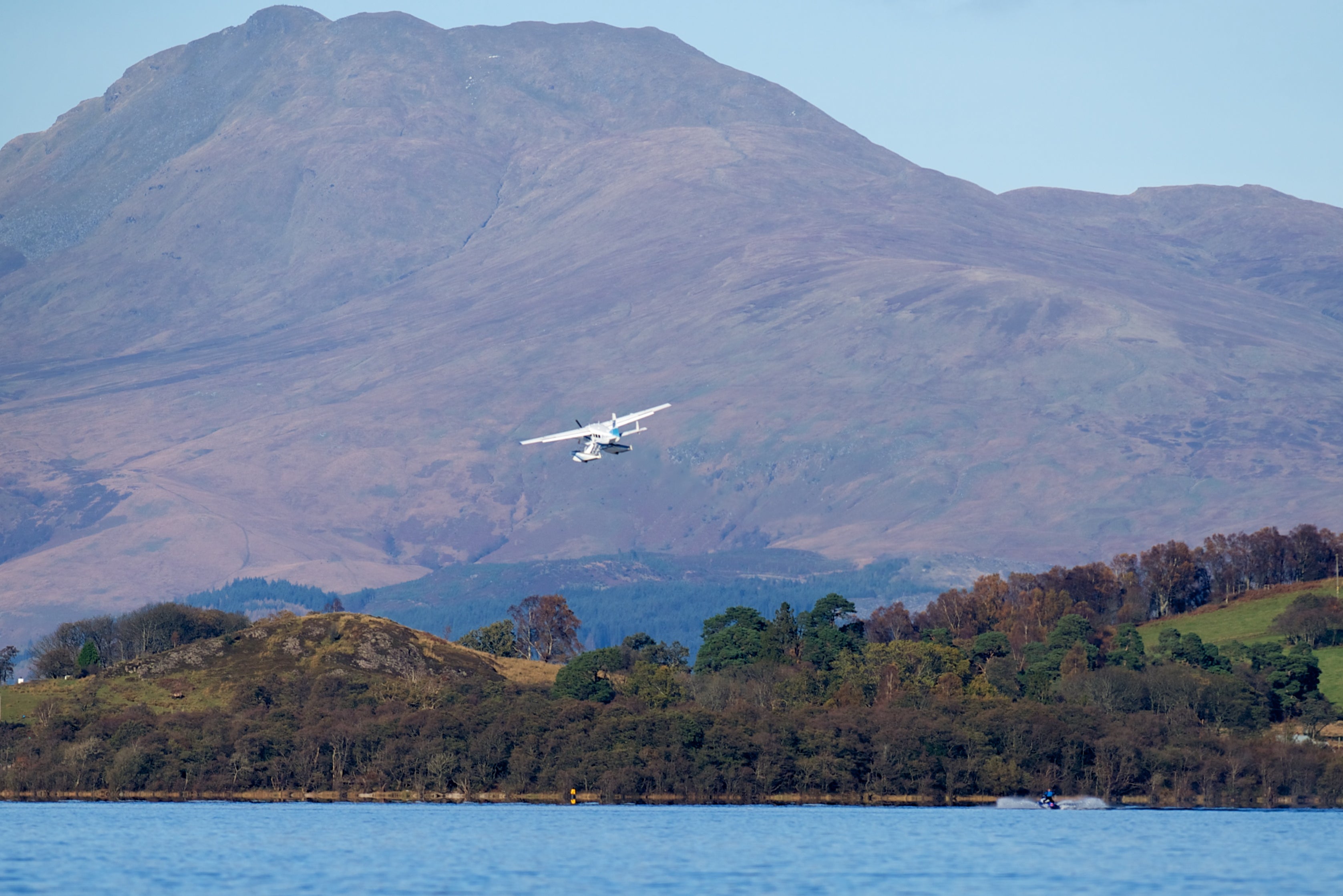 Loch in: The seaplane cruising over the water