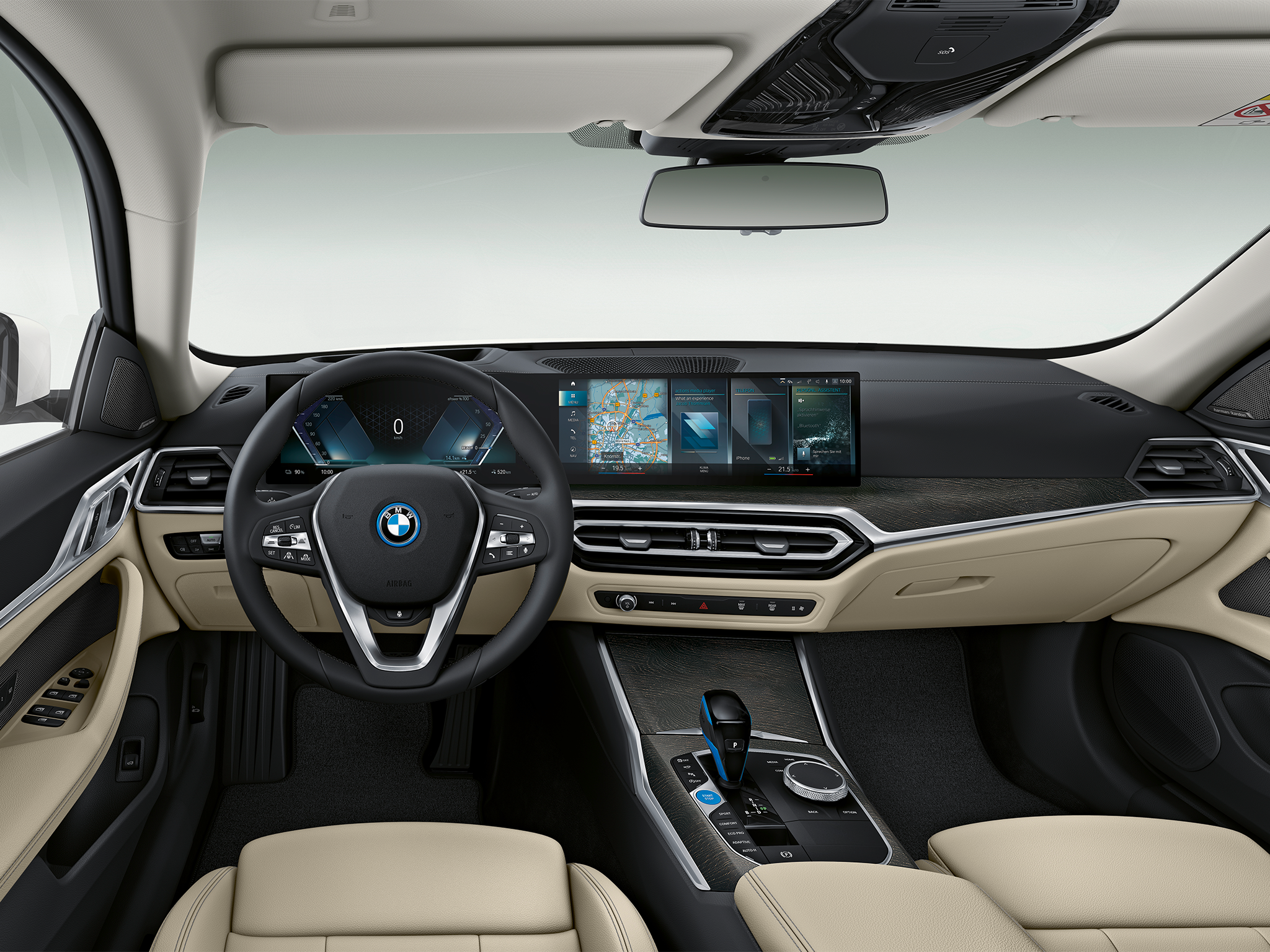 The BMW i4’s interior is packed with technology, including a curved display infotainment system.