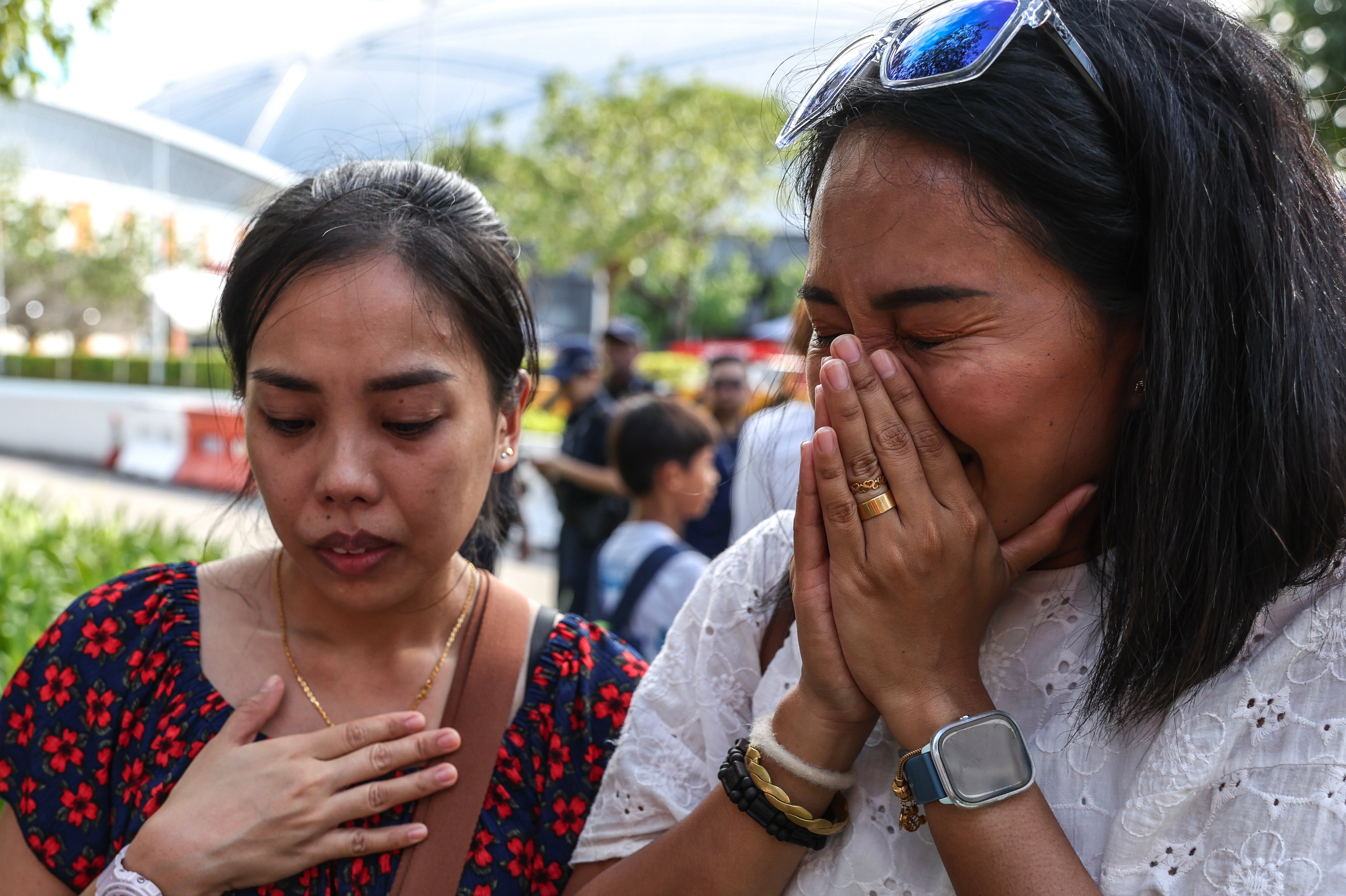 Faithful react during the arrival of Pope Francis for the holy mass Mass on 12 September 2024