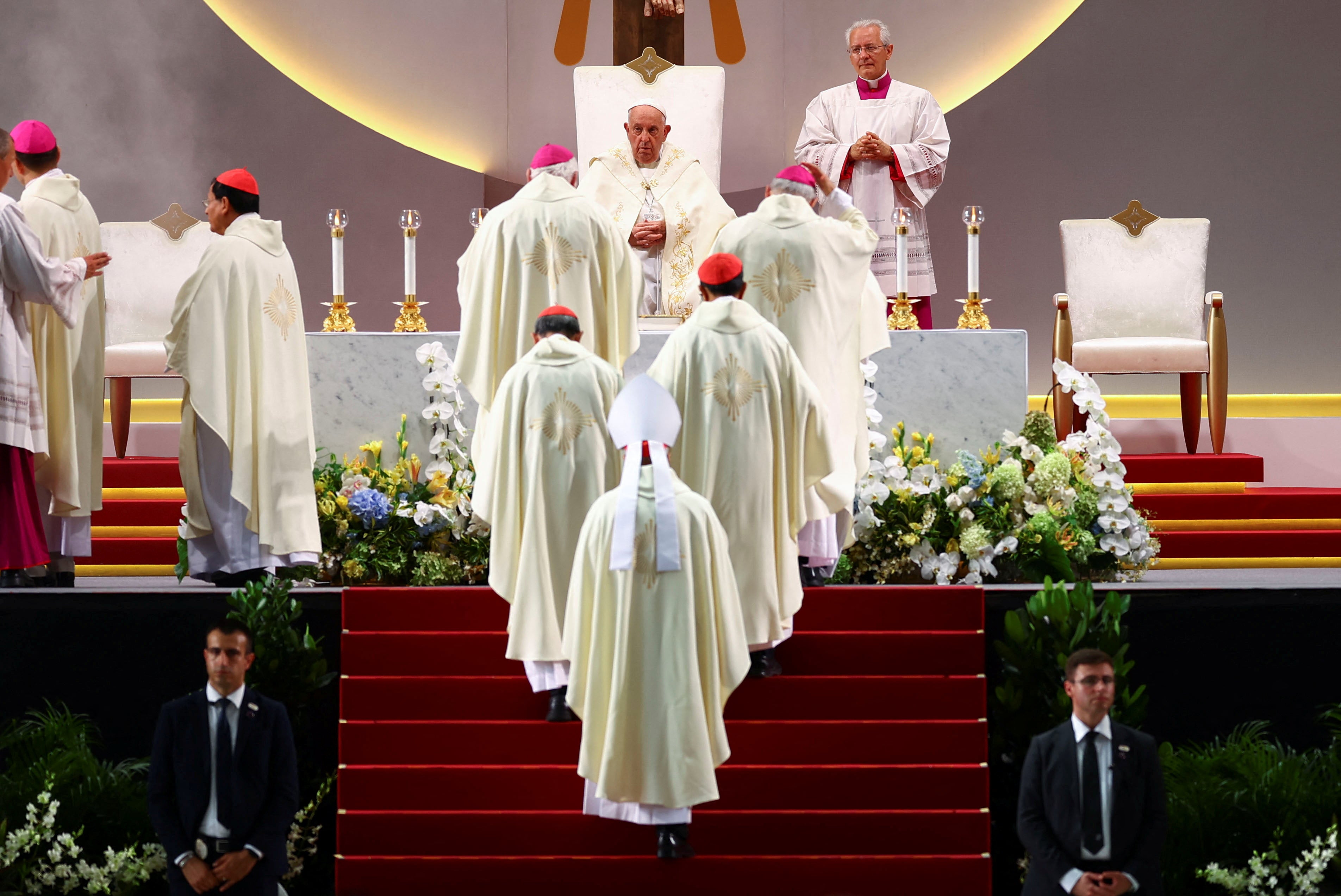 Pope Francis presides over a mass with devotees at the National Stadium in Singapore on 12 September 2024