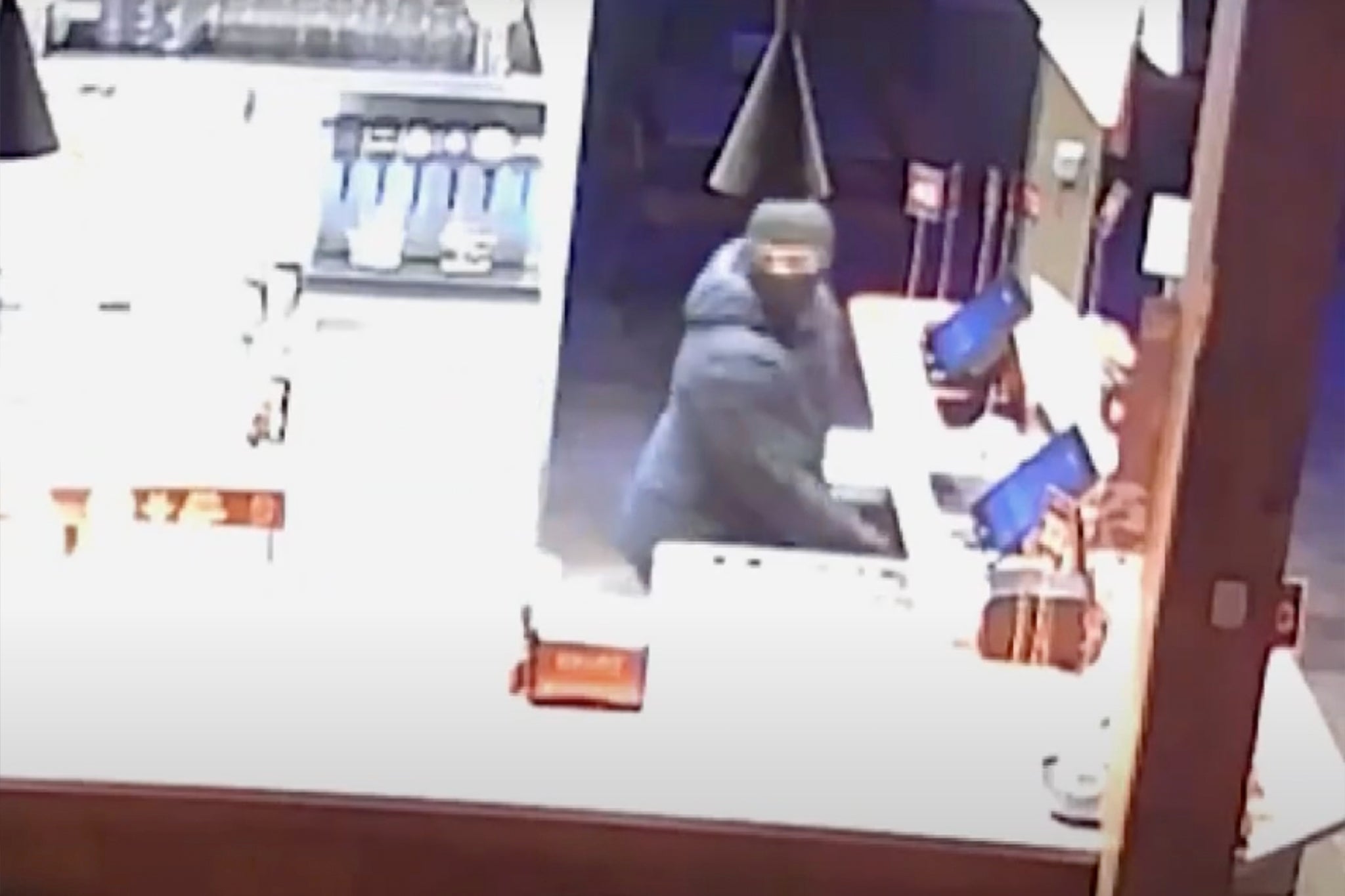 Surveillance footage shows thieves breaking into the burger joint