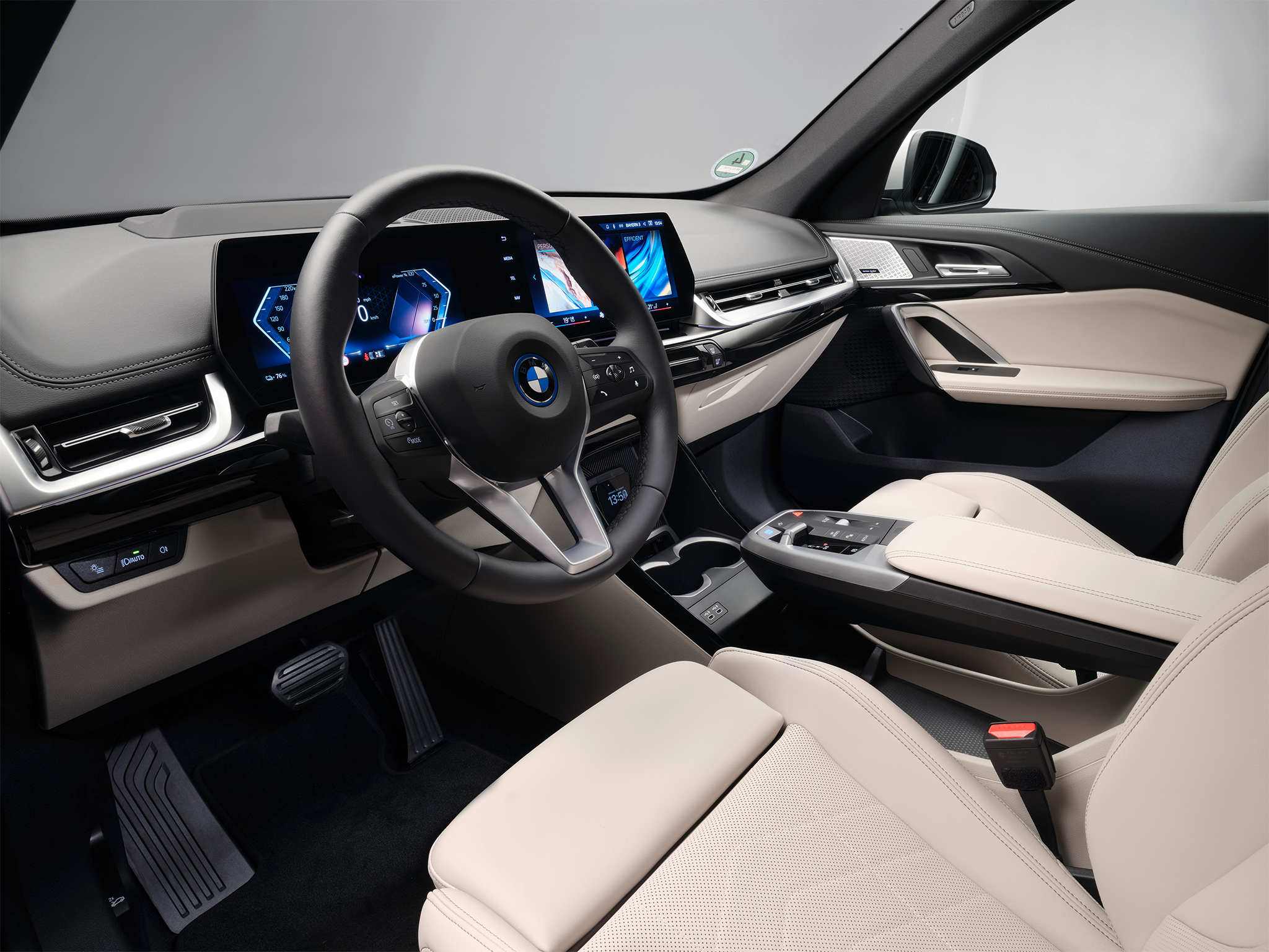 Inside, the BMW iX1 offers a premium and high-tech interior with plenty of space for passengers.