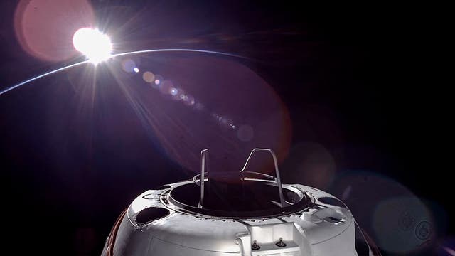 <p>This handout picture courtesy of SpaceX and Polaris taken on September 12, 2024, shows an orbital sunset from the SpaceX Dragon capsule with a hatch structure called "Skywalker", ahead of the first private spacewalk performed by the crew of the SpaceX Polaris Dawn mission</p>