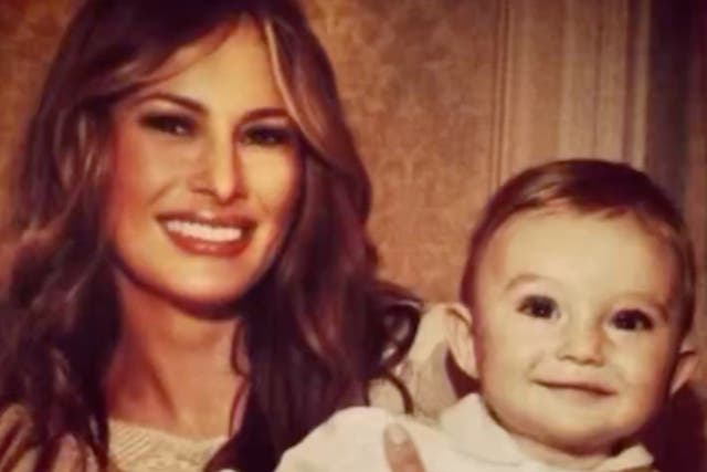 <p>Melania Trump shared this image of her and a young Barron in the video </p>