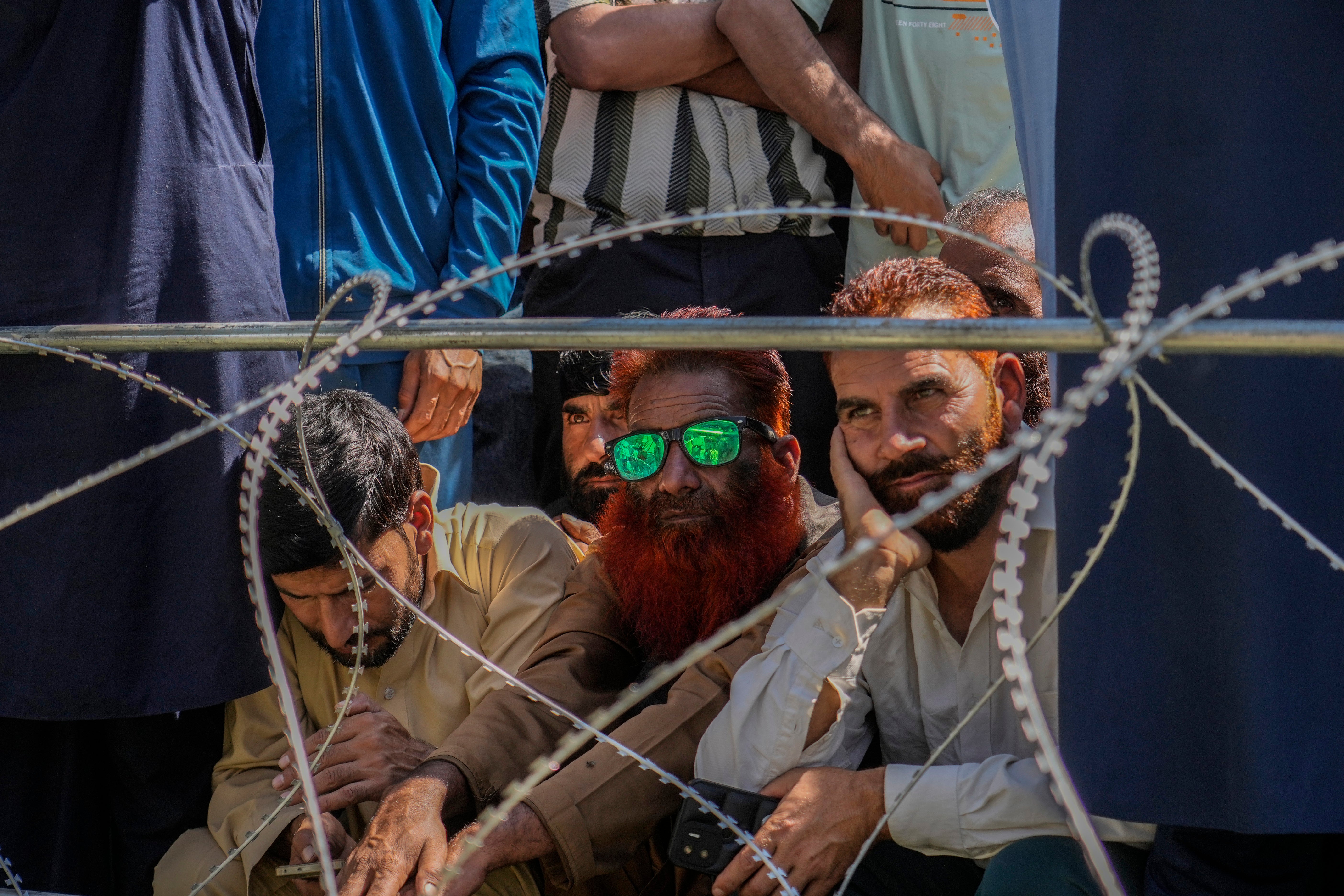 Supporters of Awami Ittehad Party leader Sheikh Abdul Rashid attend an election campaign rally in Baramulla, Kashmir