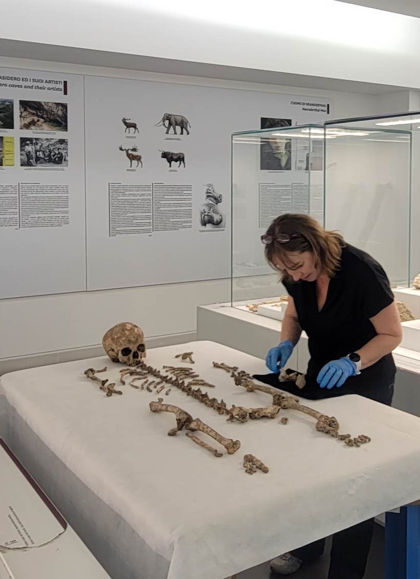 Dr Mary Lewis from the University of Reading inspecting the skeletal remains of Romito 2 found in southern Italy