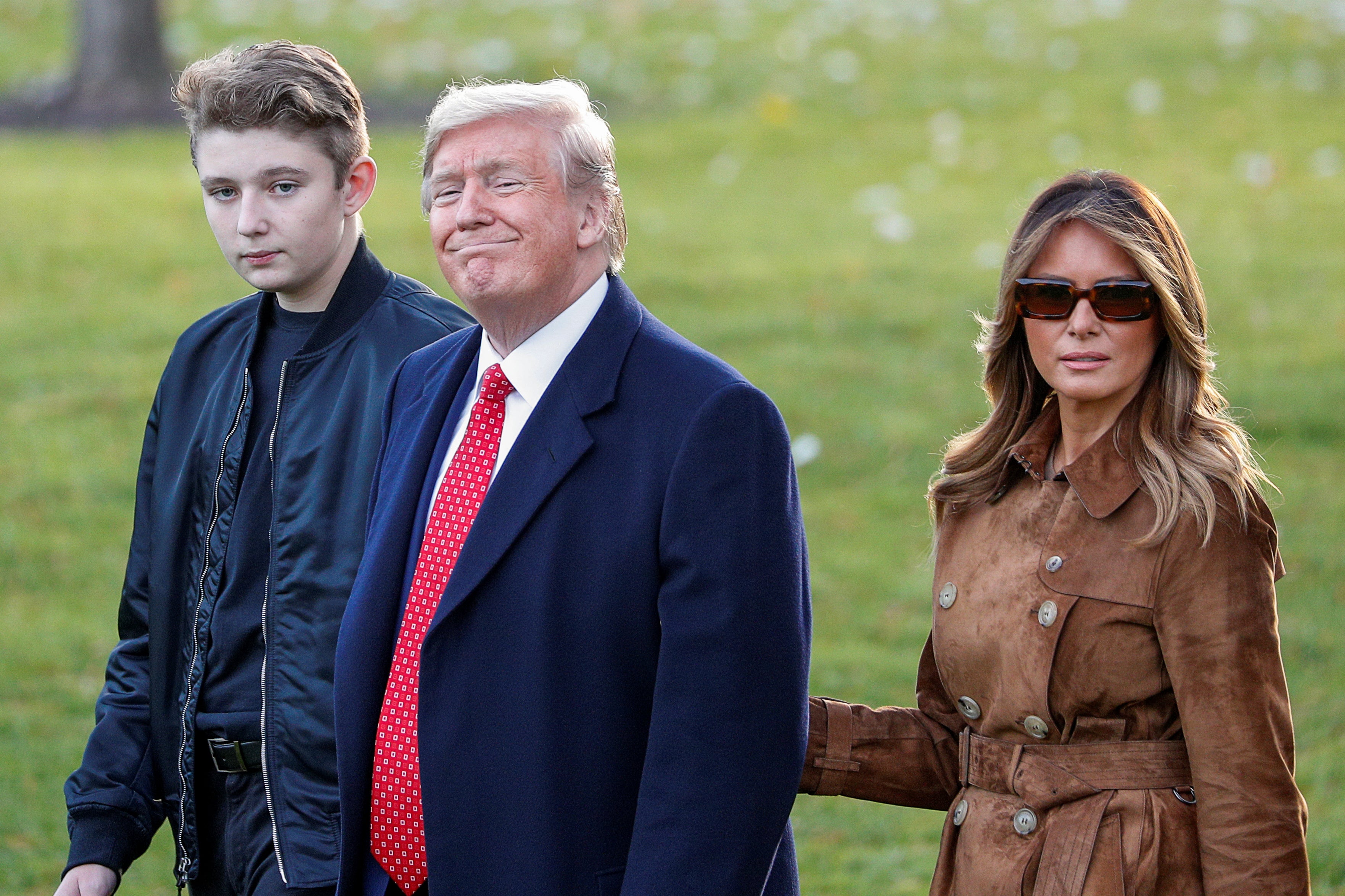 Barron (pictured with Melania and Donald Trump) is living at home while studying at NYU