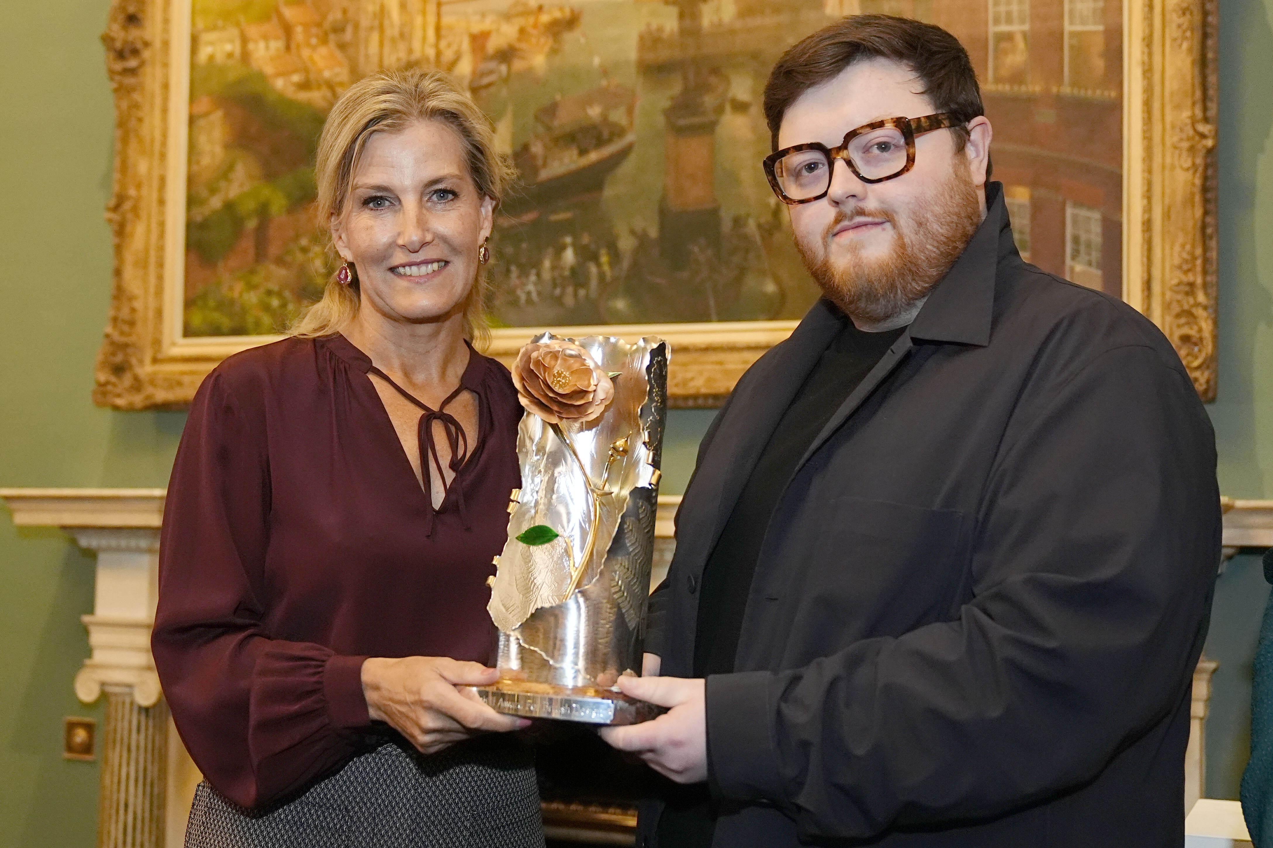 The Duchess of Edinburgh presents Steven Stokey-Daley with the British Fashion Council’s Queen Elizabeth II Award for British Design (Aaron Chown/PA)