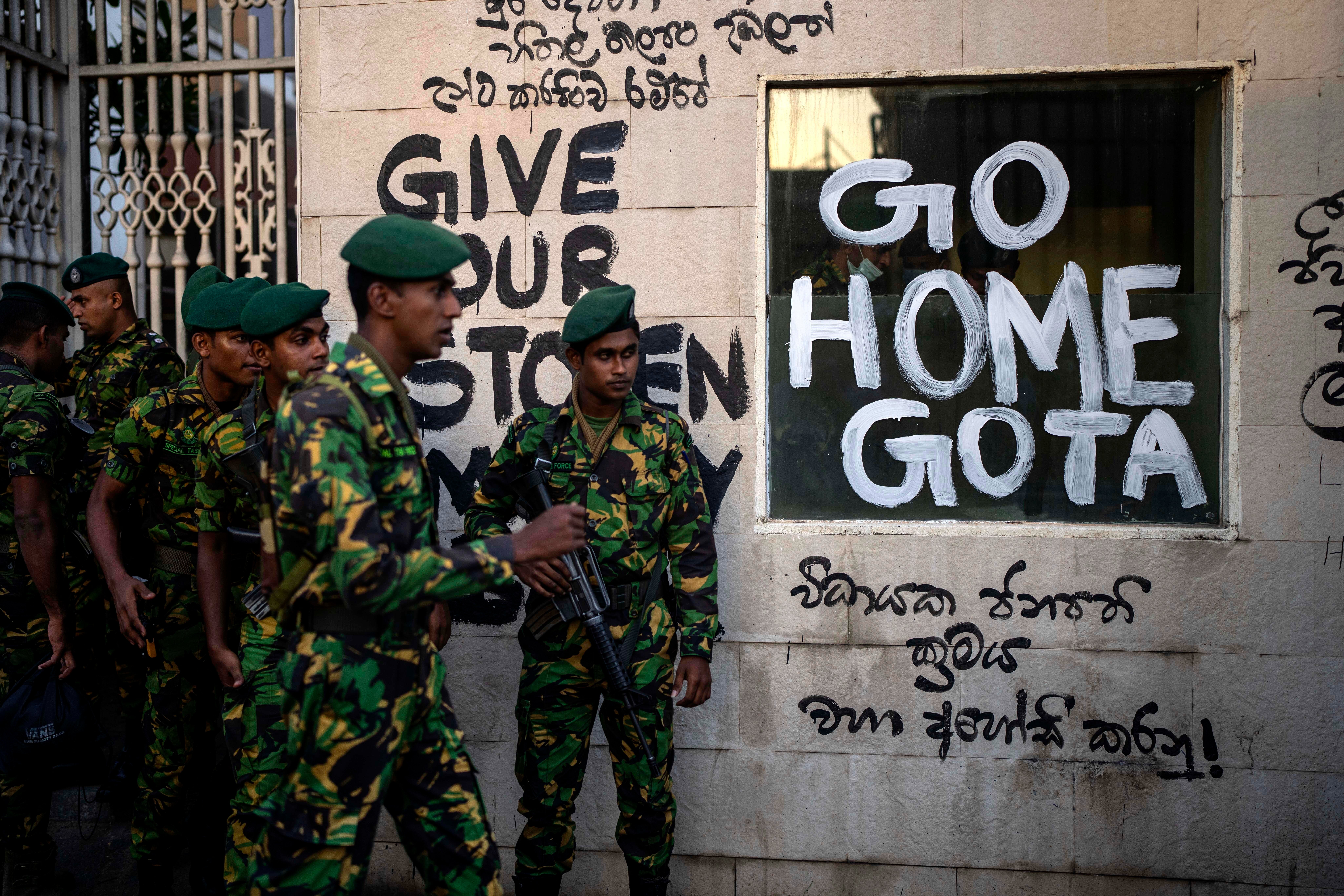 Sri Lanka service  soldiers patrol adjacent   the authoritative  residence of president   Gotabaya Rajapaksa 3  days aft  it was stormed by anti-government protestors successful  Colombo