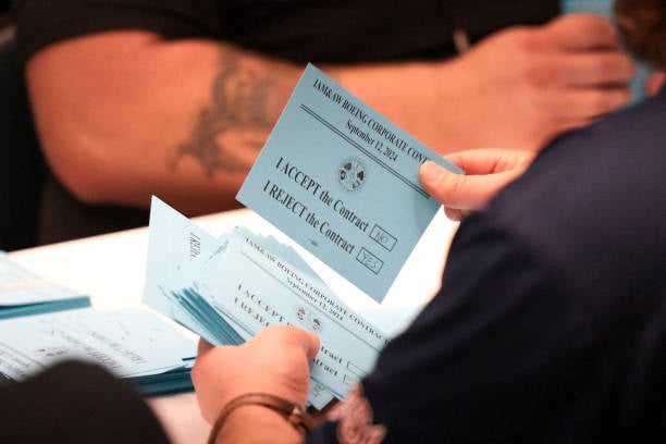 Boeing Machinists union members count votes to accept or reject a proposed contract between Boeing and union leaders and whether or not to strike if the contract is rejected, at the Aerospace Machinists Union Hall in Seattle, Washington, on 12 September 2024