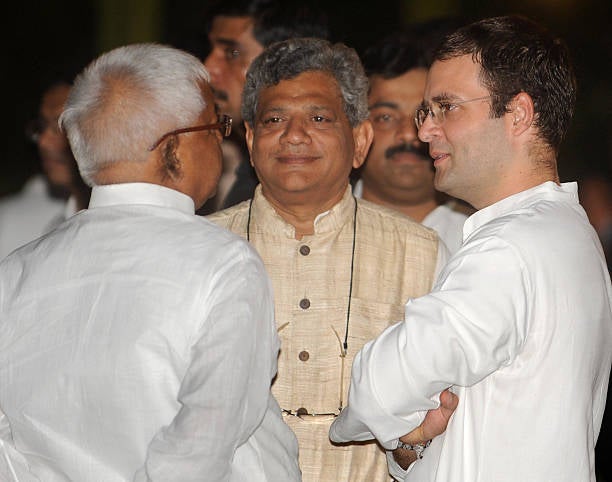 Congress Party leader Rahul Gandhi with Sitaram Yechury, centre, and former Indian railway minister Lalu Prasad Yadav in New Delhi on 18 September 2009