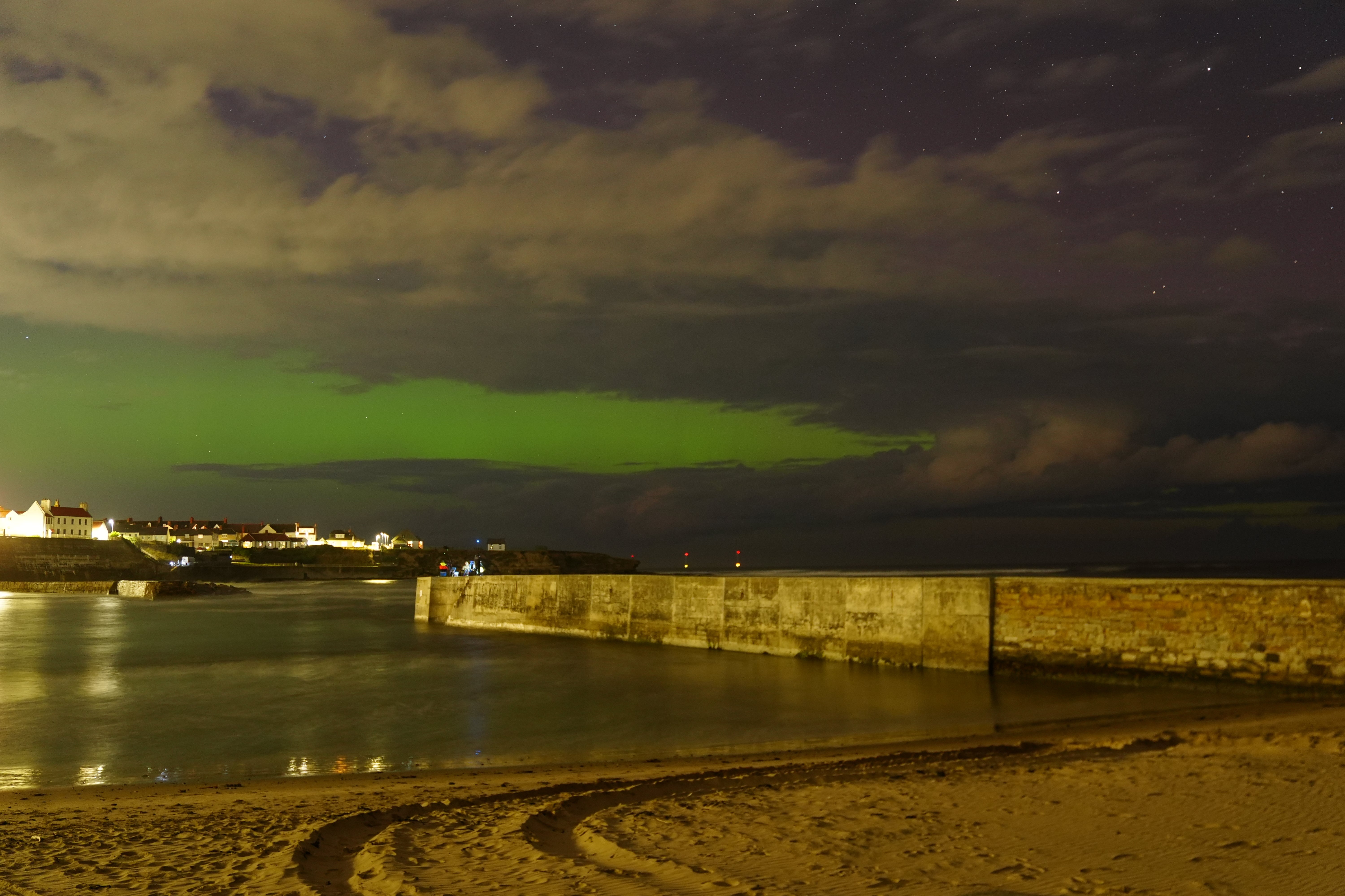 The Northern Lights in the skies over Cullercoats Bay in North Tyneside on Thursday 12 September