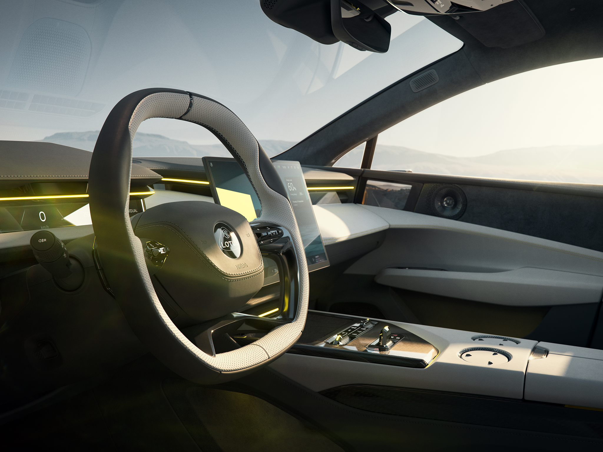 The minimalist interior of the Lotus Emeya is dominated by a large central touchscreen.